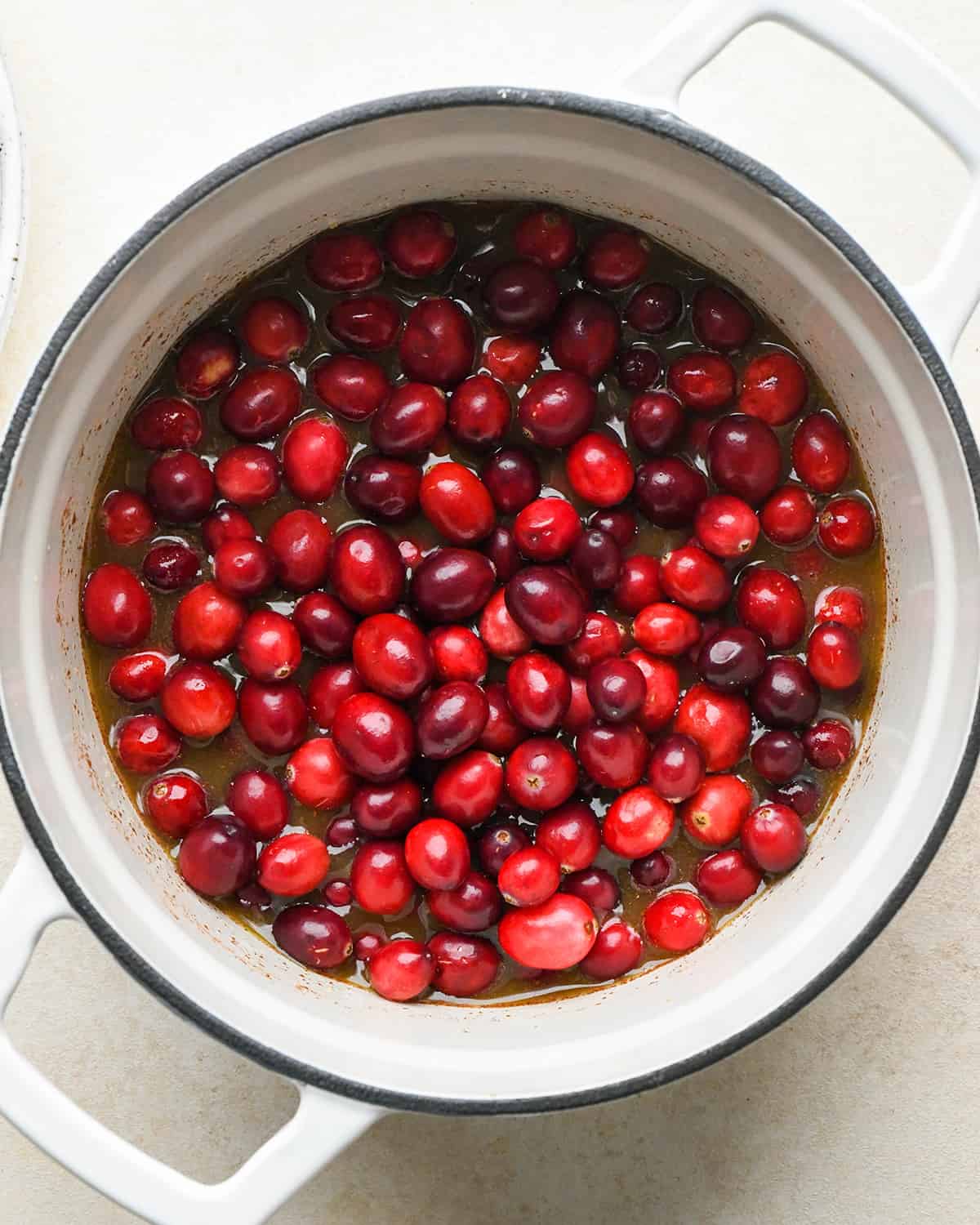 making Cranberry Cream Cheese Dip - adding cranberries