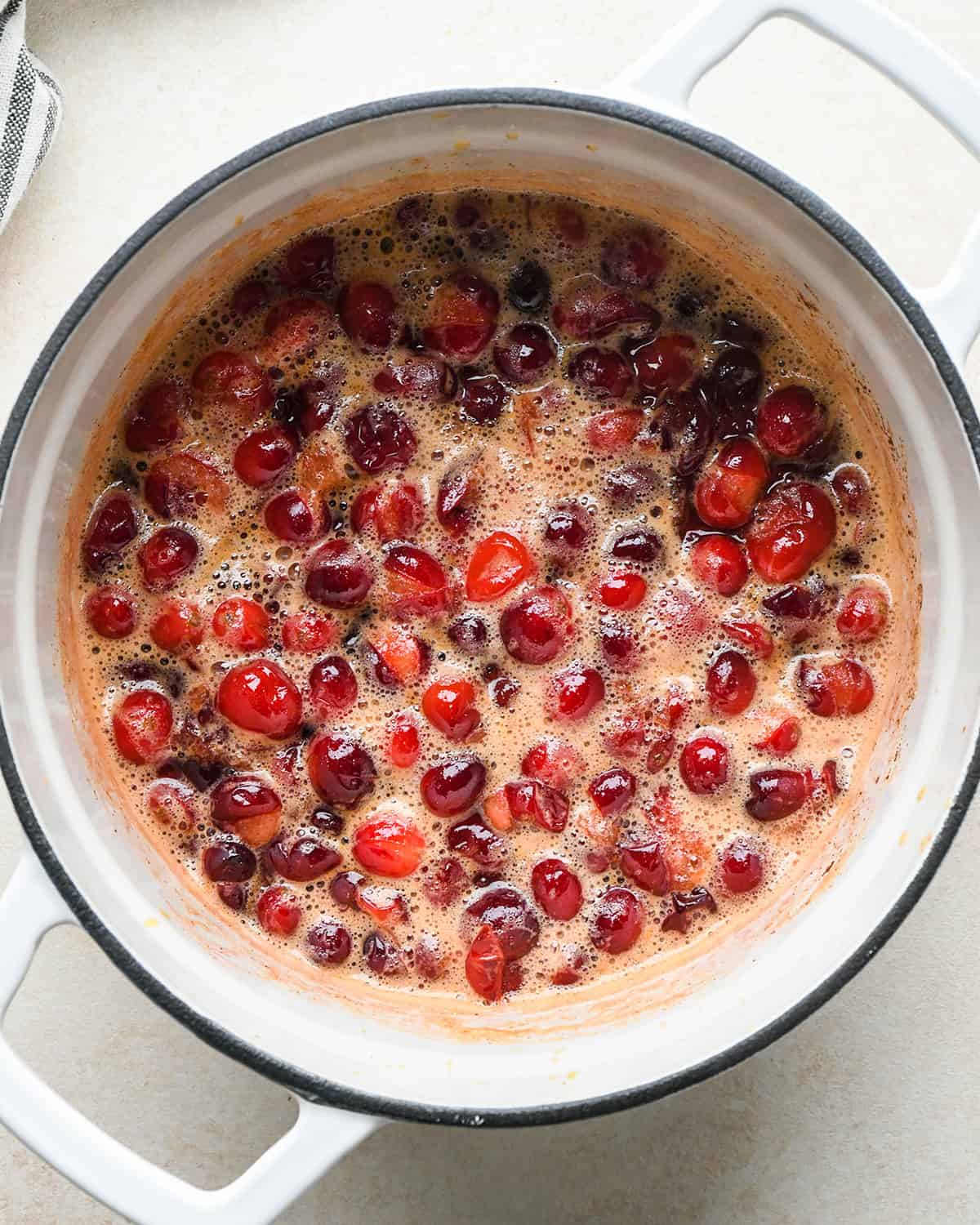 Cranberry Cream Cheese Dip - cranberry mixture cooking in a pot