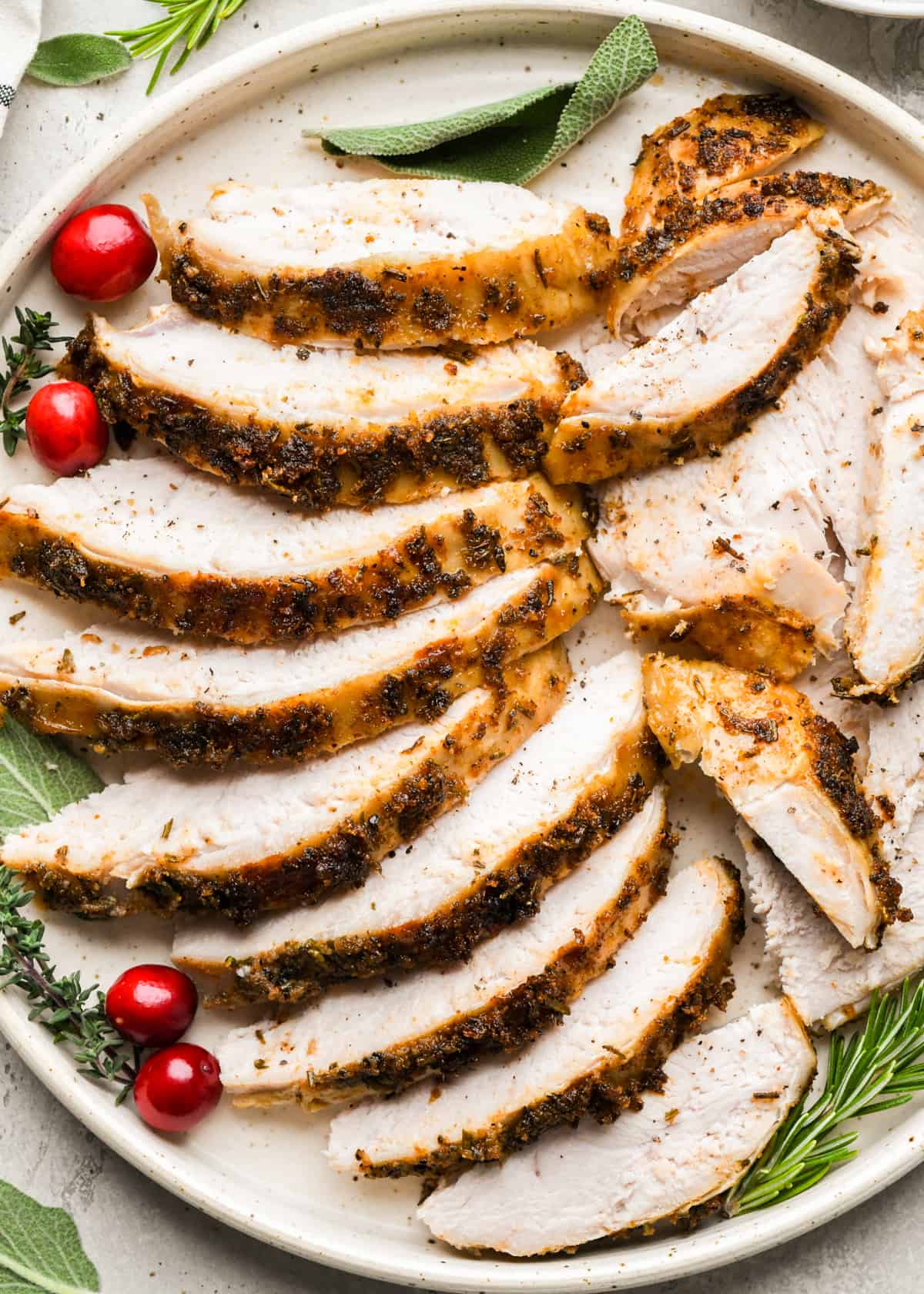 sliced Crock Pot Turkey Breast on a serving plate