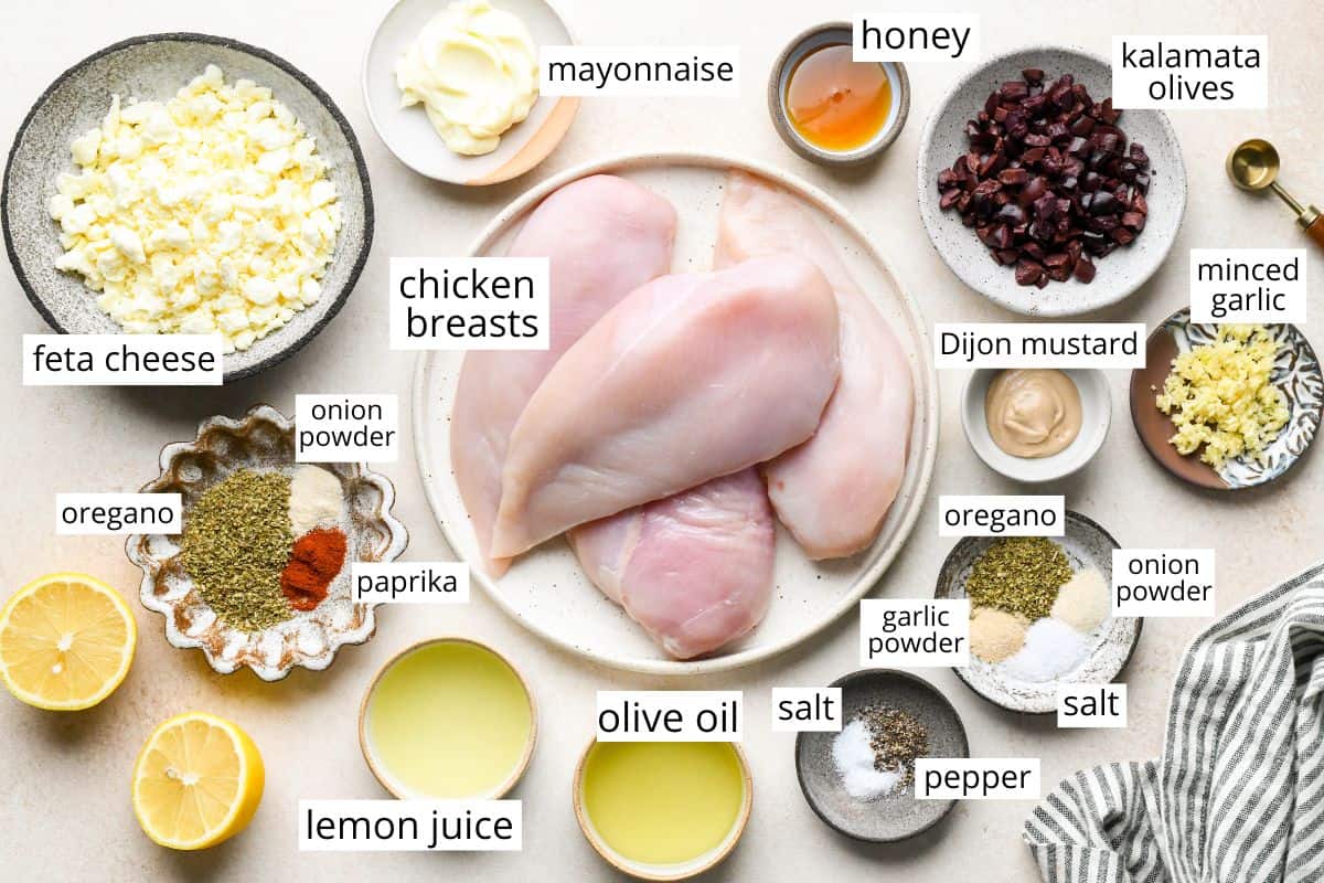 overhead photo of the labeled ingredients in this Feta Stuffed Chicken Breasts recipe