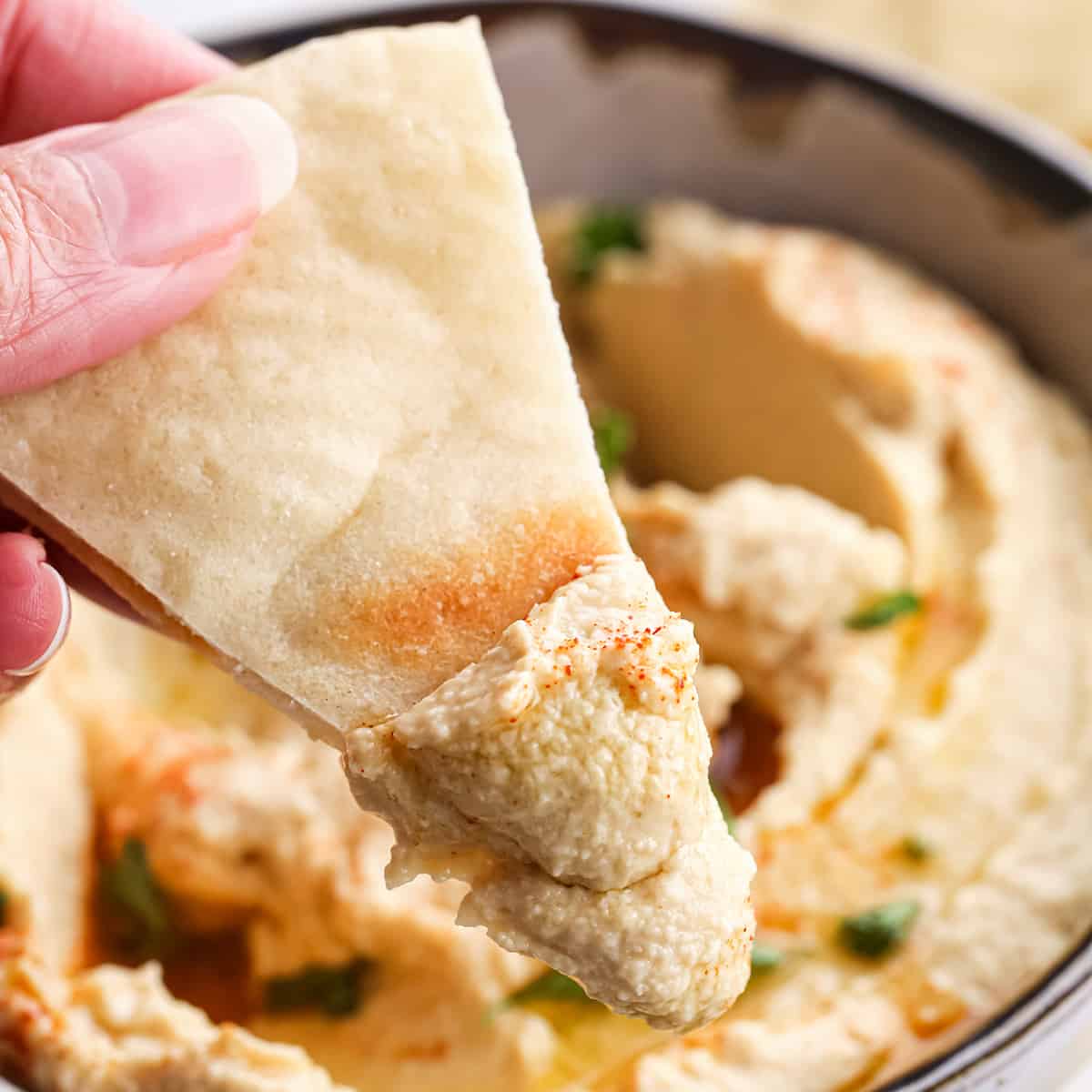 Homemade Hummus on a triangle of pita bread