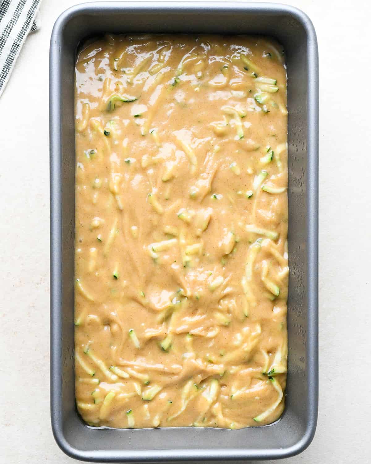 How to Make Zucchini Bread - batter in a loaf pan before baking