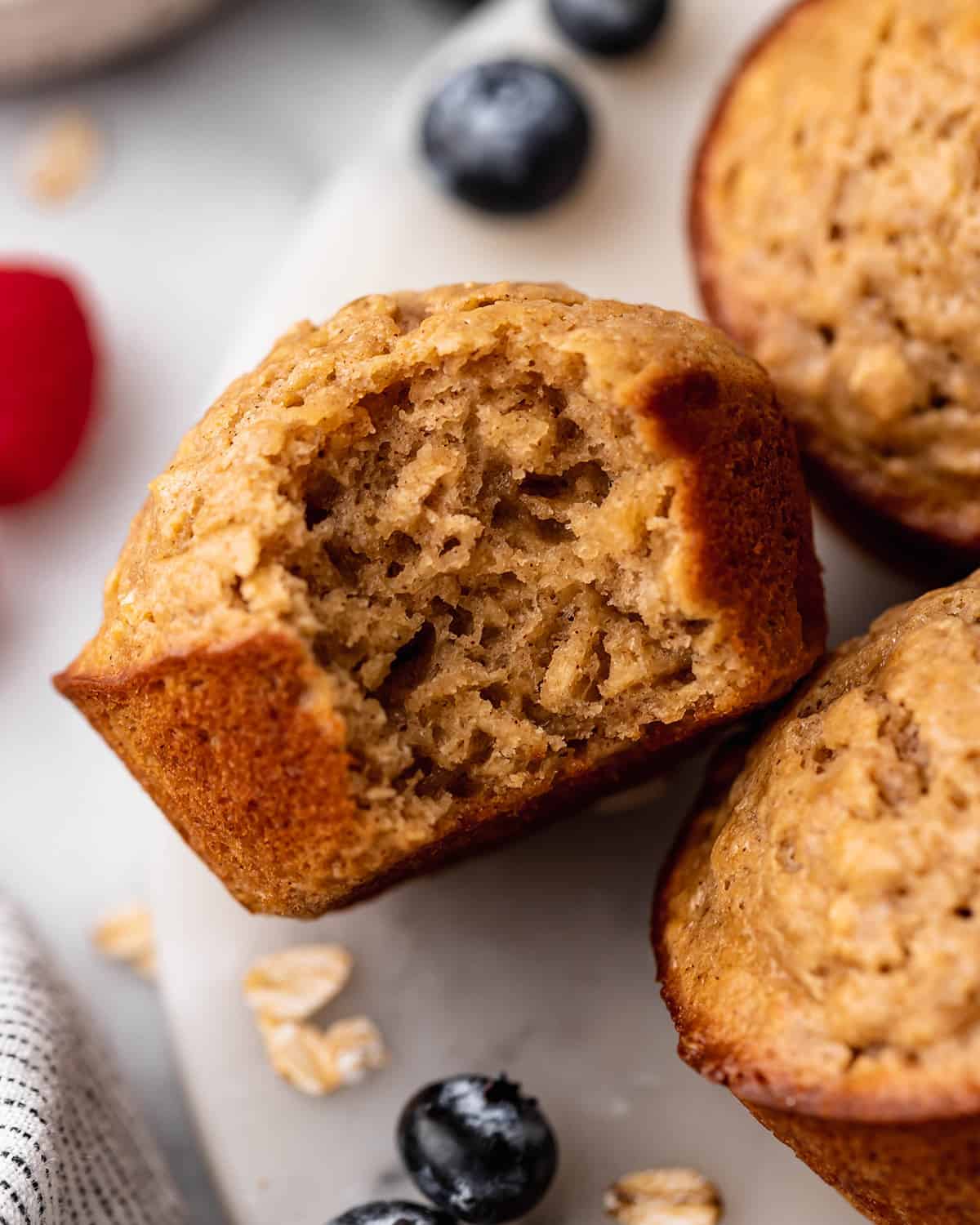 up close photo of an Oatmeal Muffin with a bite taken out of it