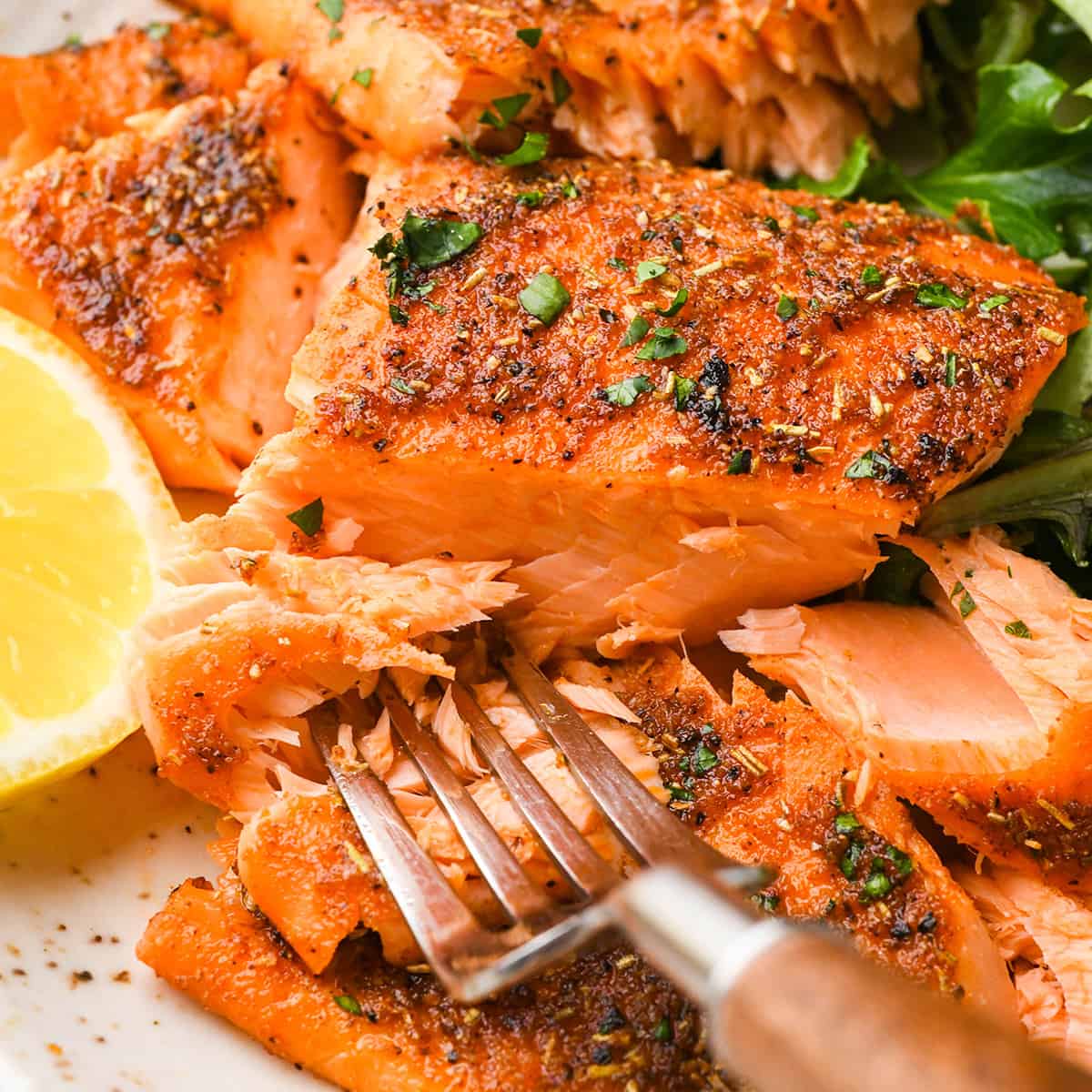 oven baked salmon on a plate with a fork