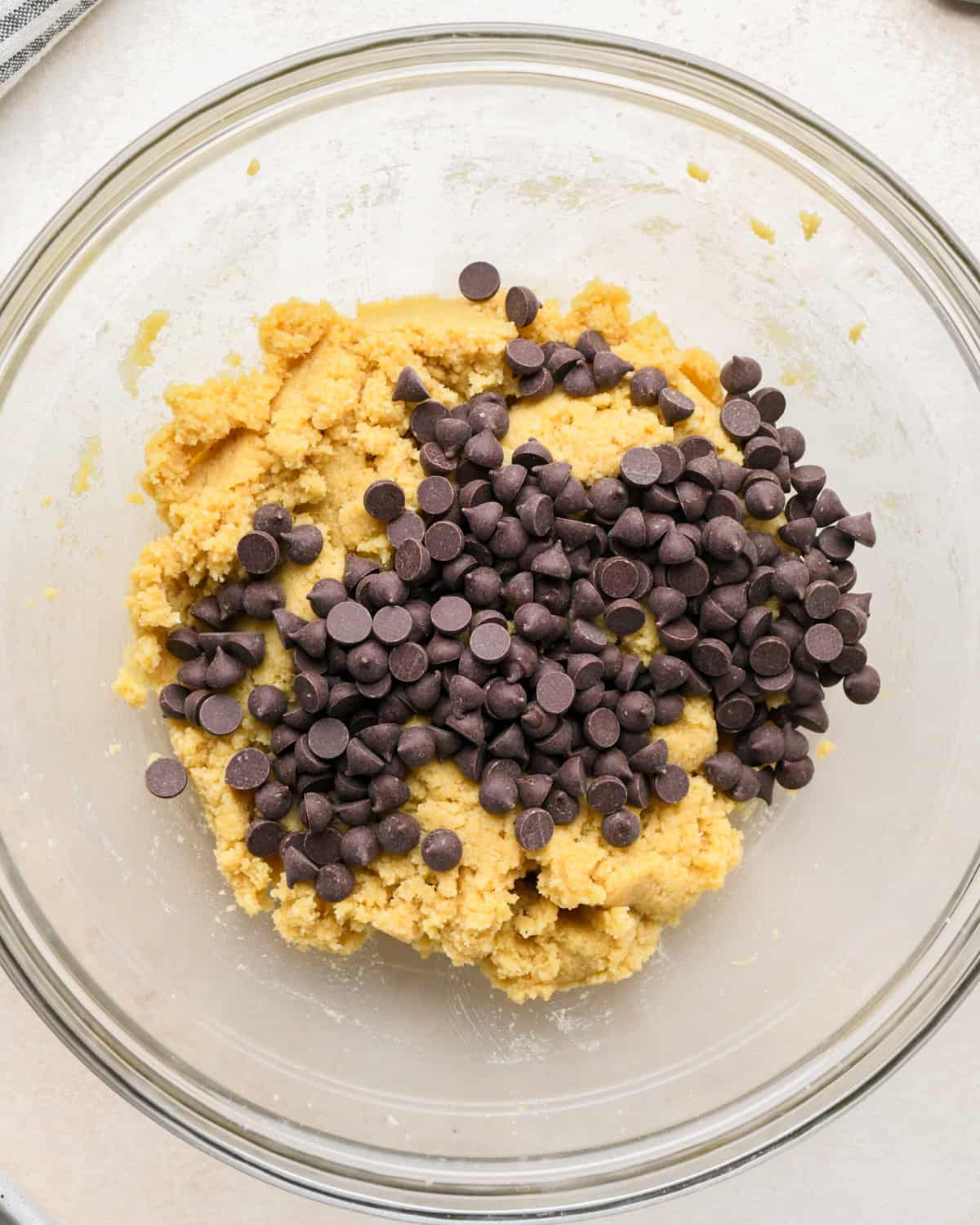 how to make almond flour cookies - adding chocolate chips before mixing