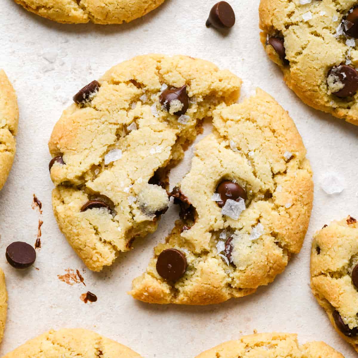 an almond flour cookie torn in half