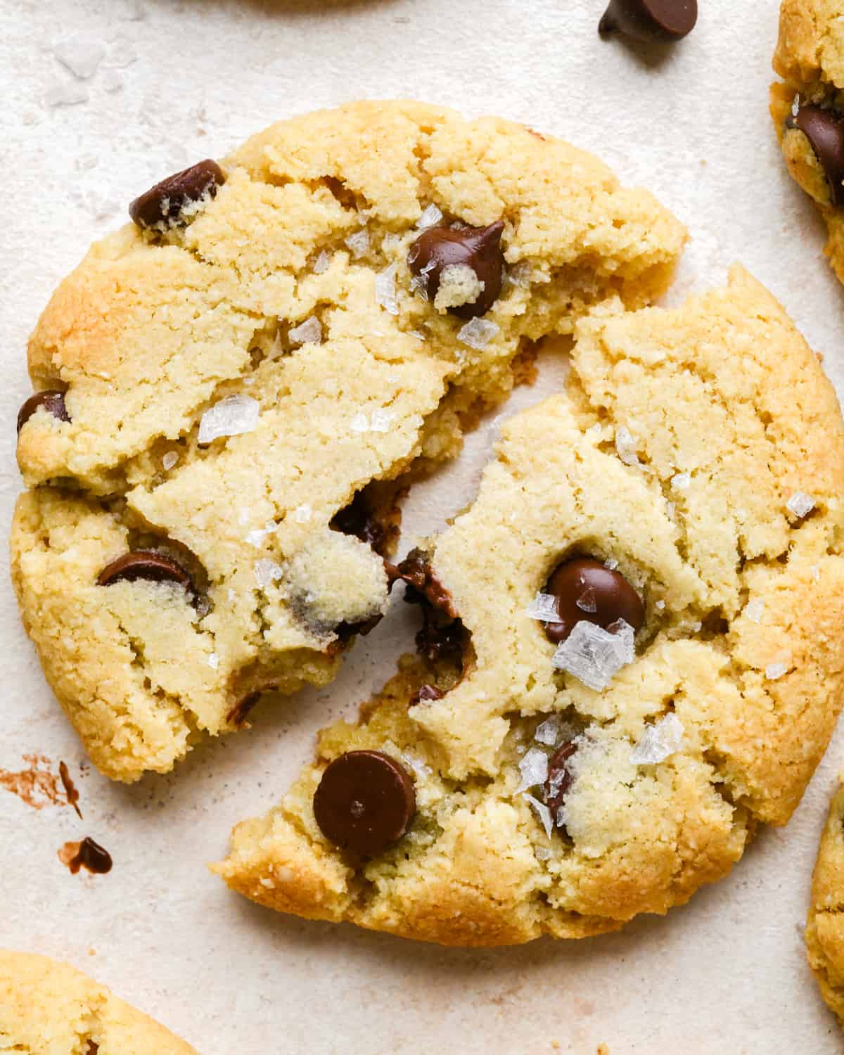 an Almond Flour Chocolate Chip Cookies torn in half