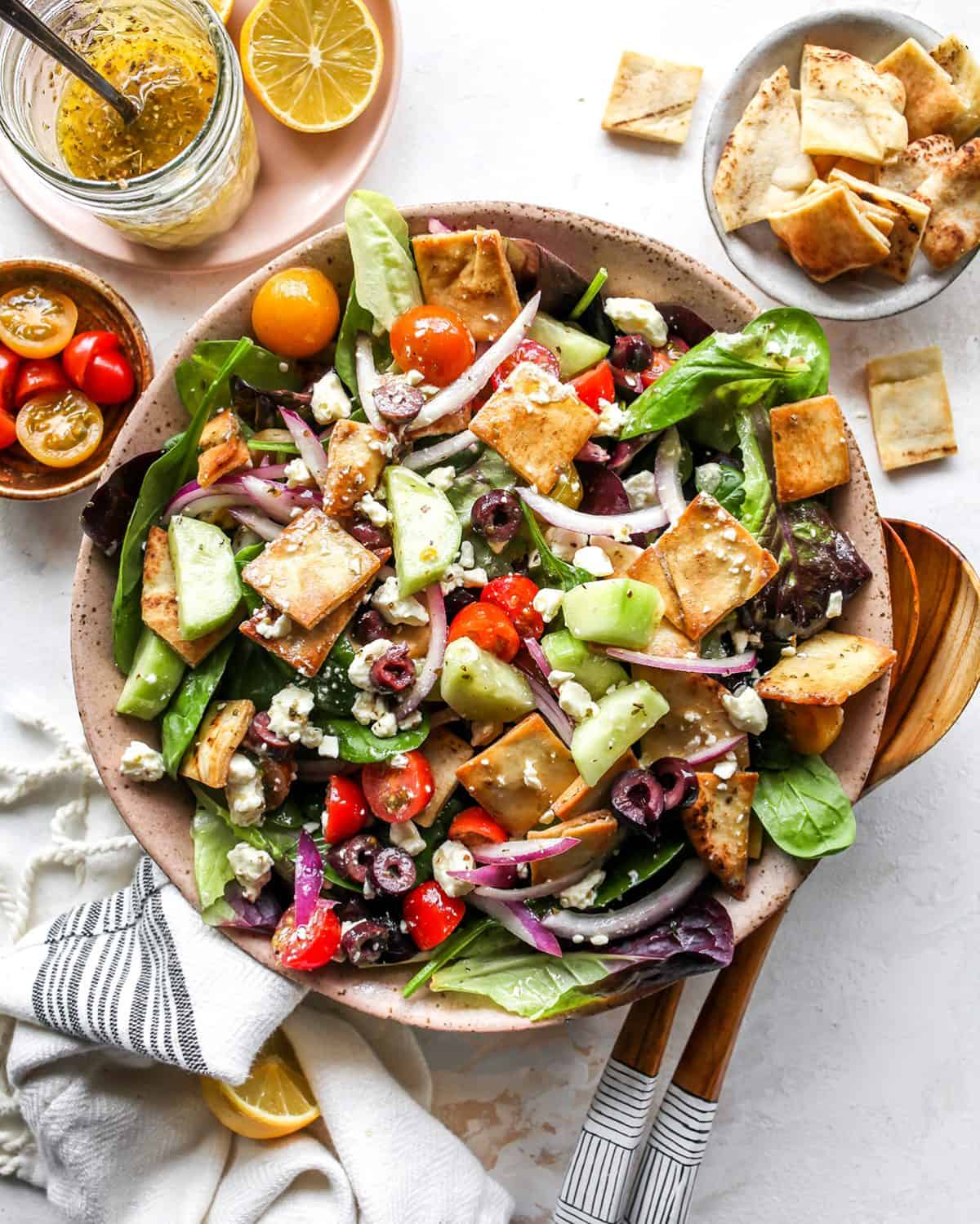 greek salad assembled in a serving bowl 