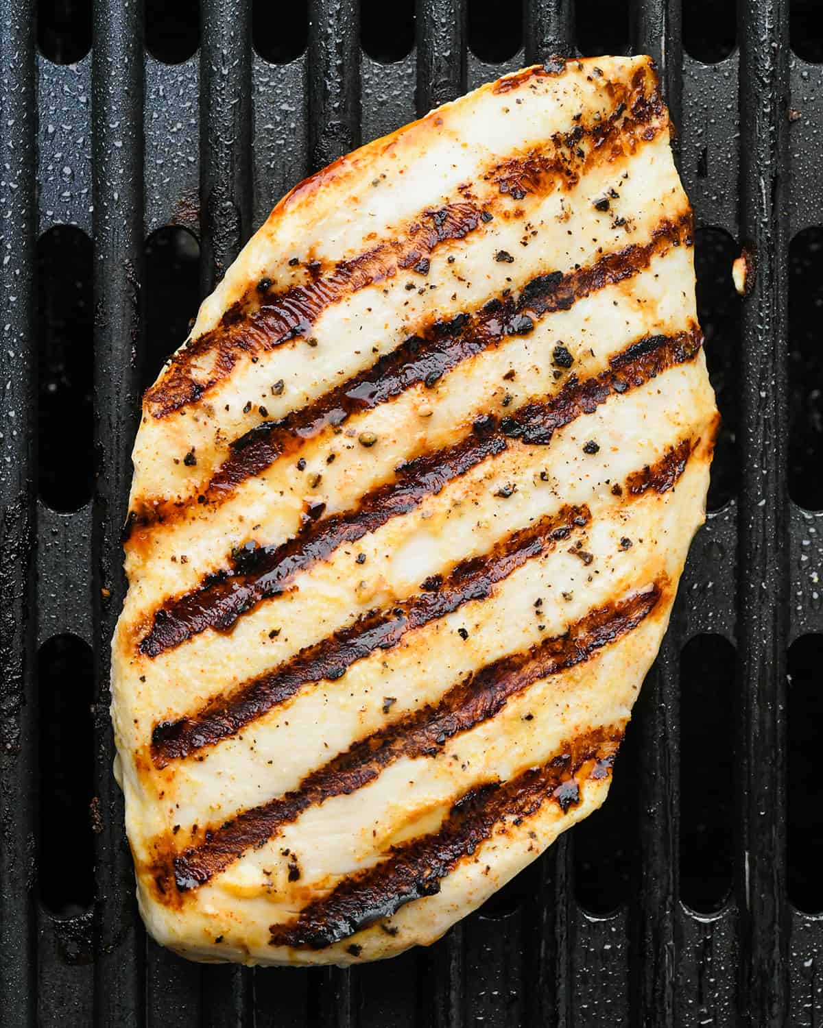 Buttermilk Chicken being grilled on the second side on a grill pan