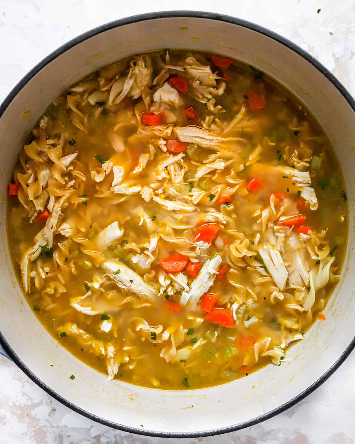 How to Make Chicken Noodle Soup - adding noodles before they are cooked