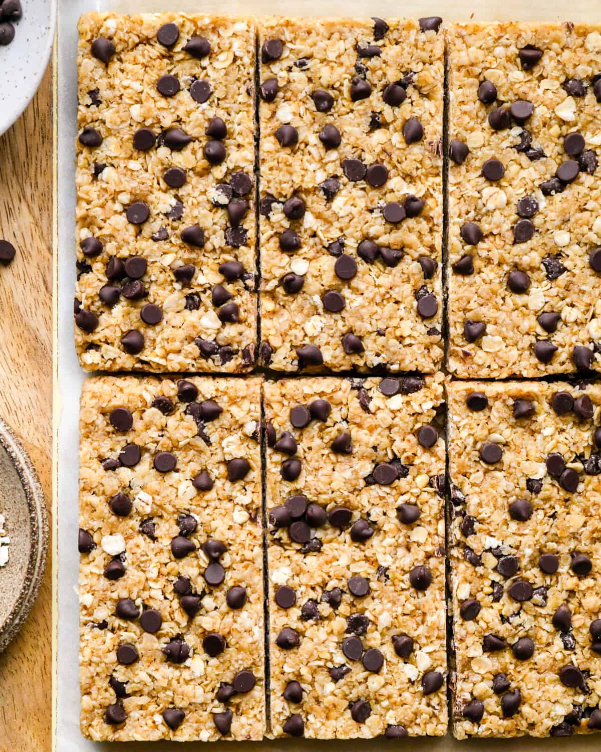 homemade granola bars on a cutting board after cutting