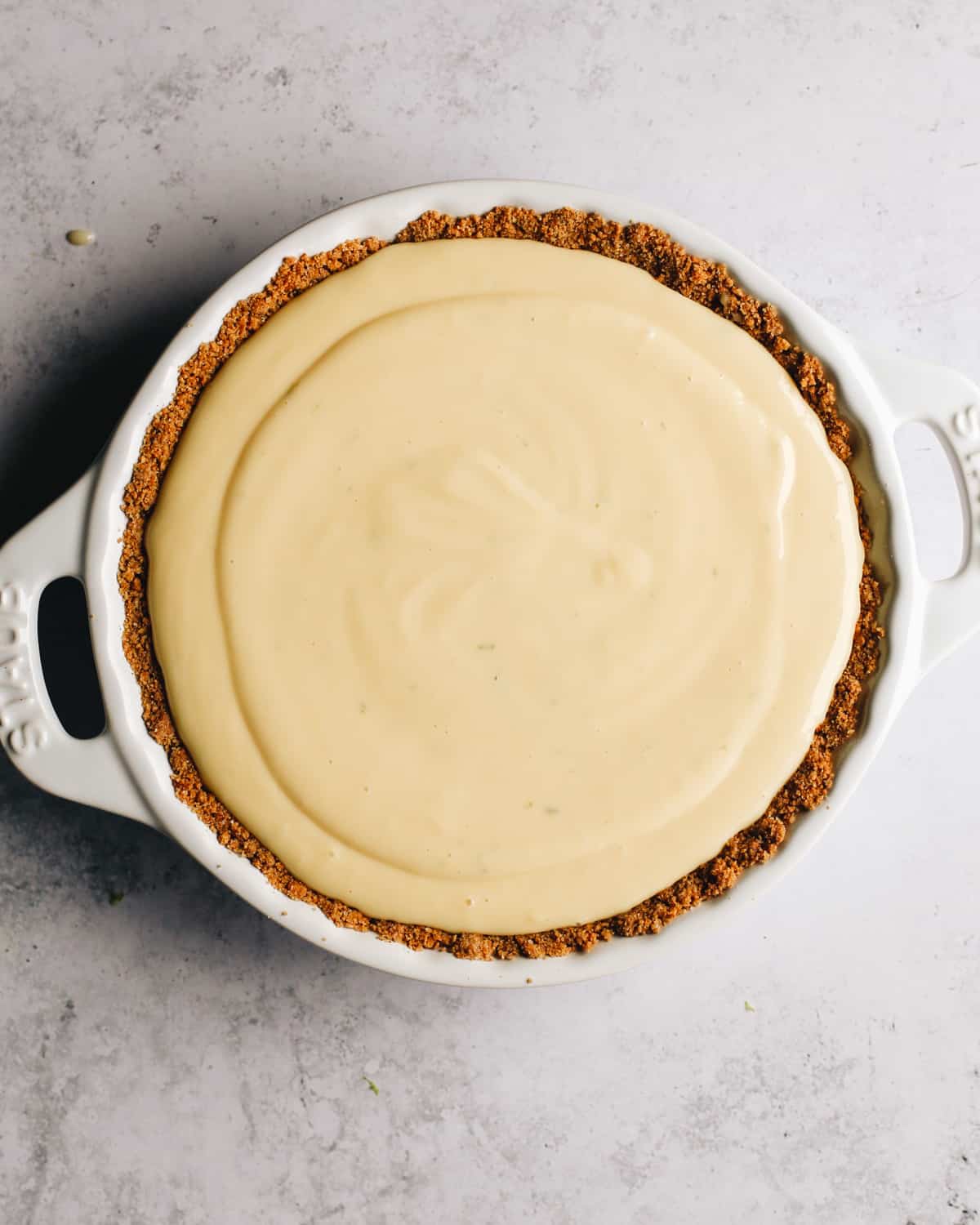 key lime pie in a baking dish before baking