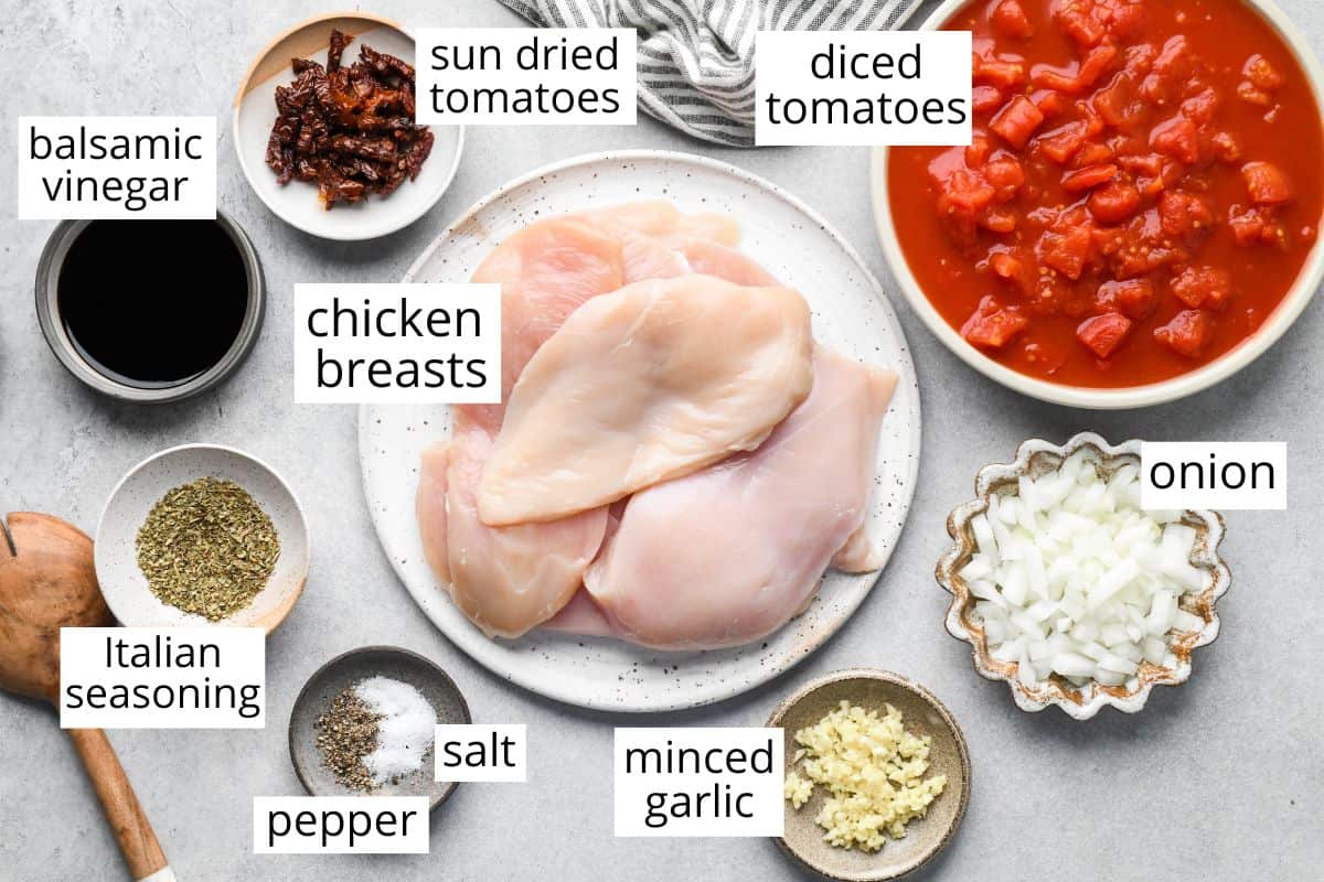 overhead photo of the labeled ingredients in this Slow Cooker Italian Chicken recipe