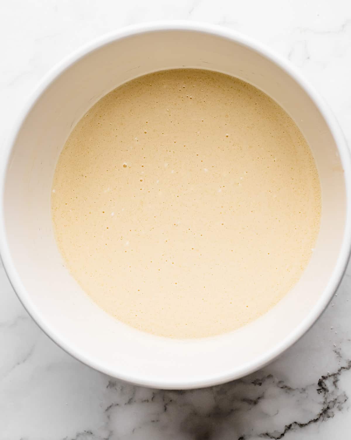 how to make coconut cake- mixed wet mixture in a bowl