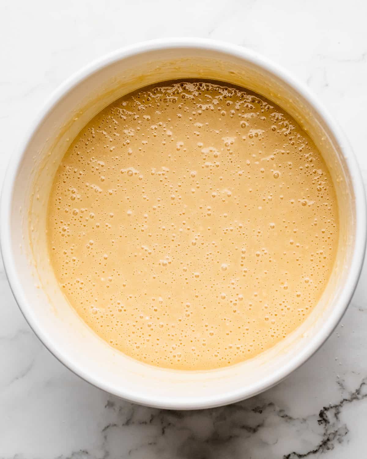 how to make coconut cake- cake batter in a bowl