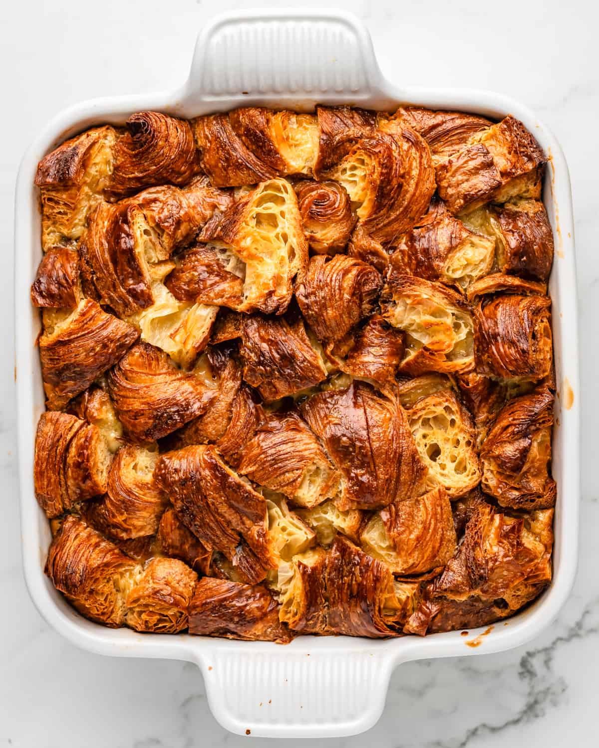 Croissant Bread Pudding in a baking dish after baking