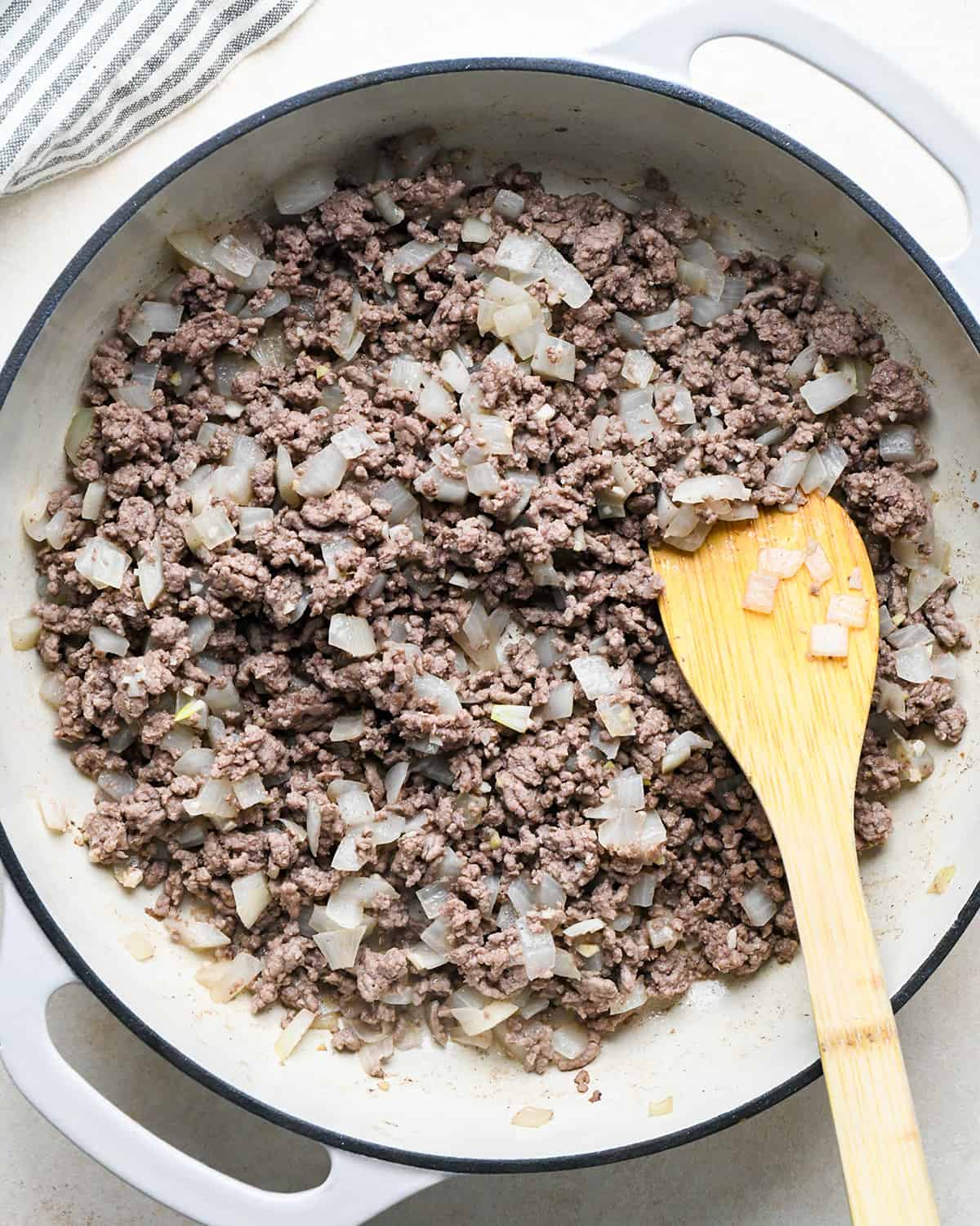 How to Make Hamburger Soup - beef, onion and garlic in a pan after cooking