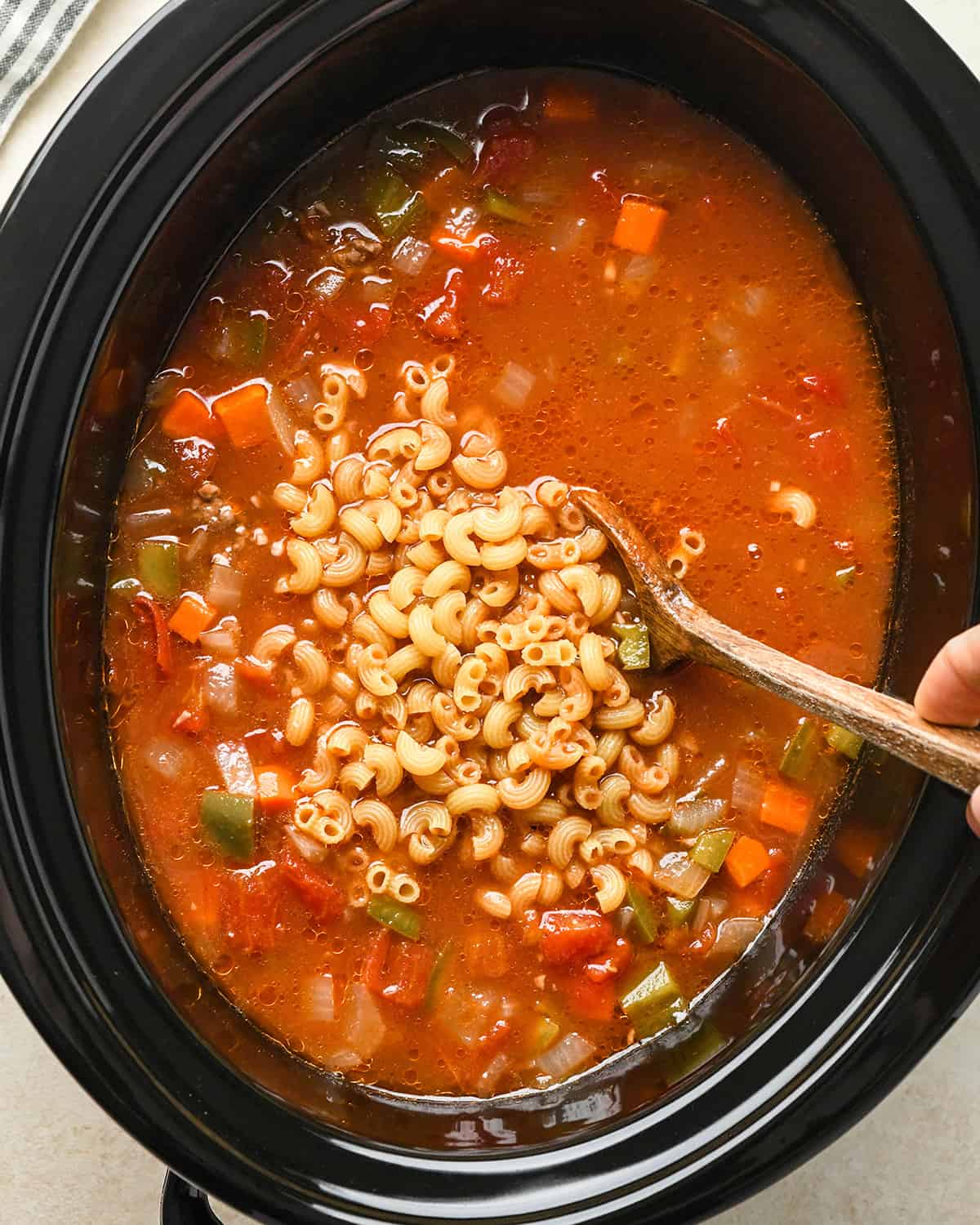 How to Make Hamburger Soup - stirring in macaroni