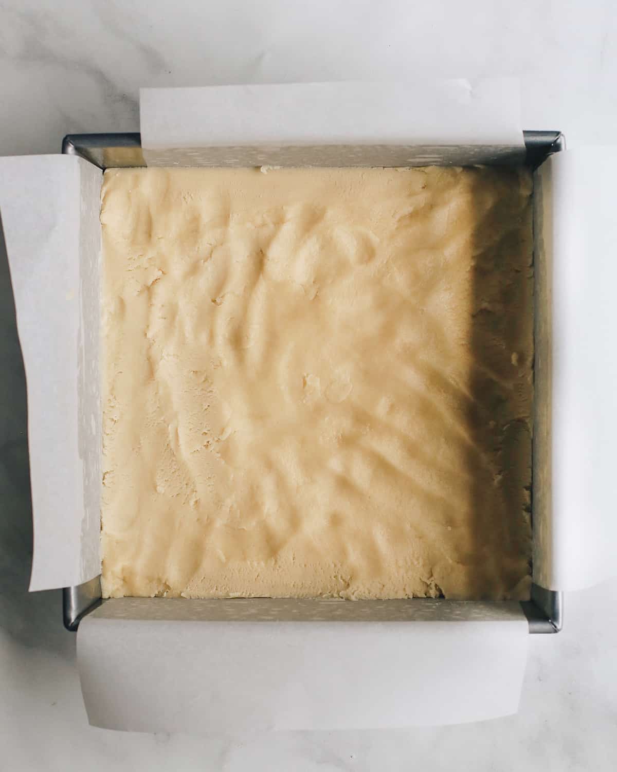 How to Make Lemon Bars forming the shortbread crust
