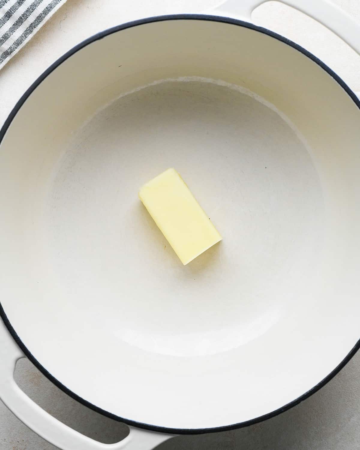 How to Make Parmesan Pasta - butter in a pot before melting