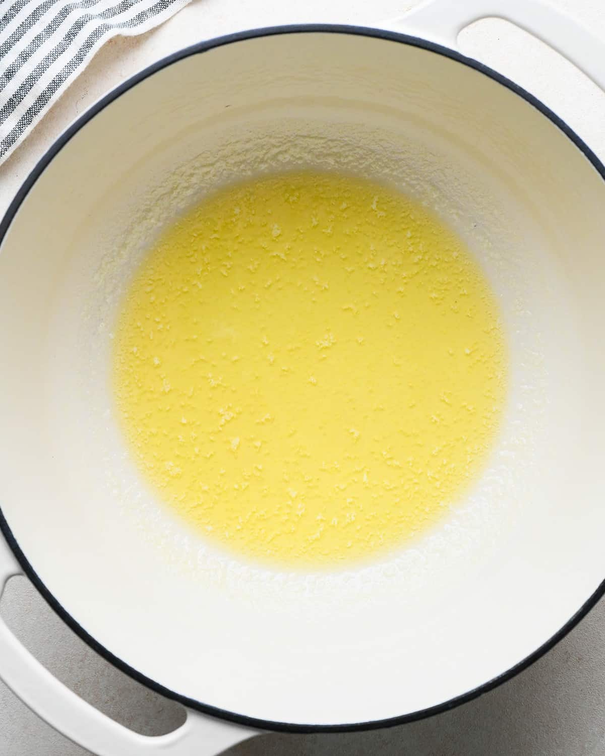 How to Make Parmesan Pasta - melted butter in a pot