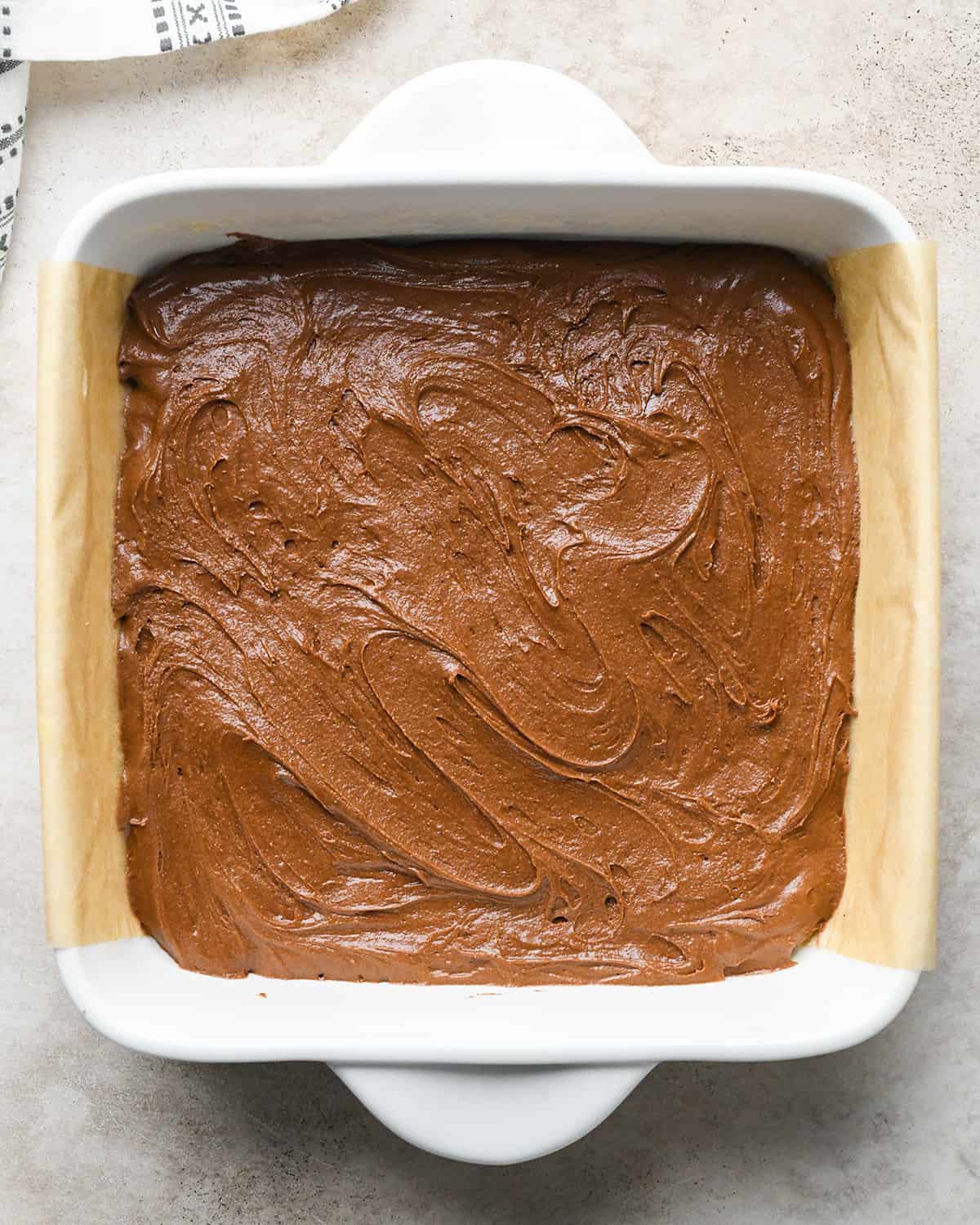 assembling Peanut Butter Cup Brownies - batter spread into a baking dish