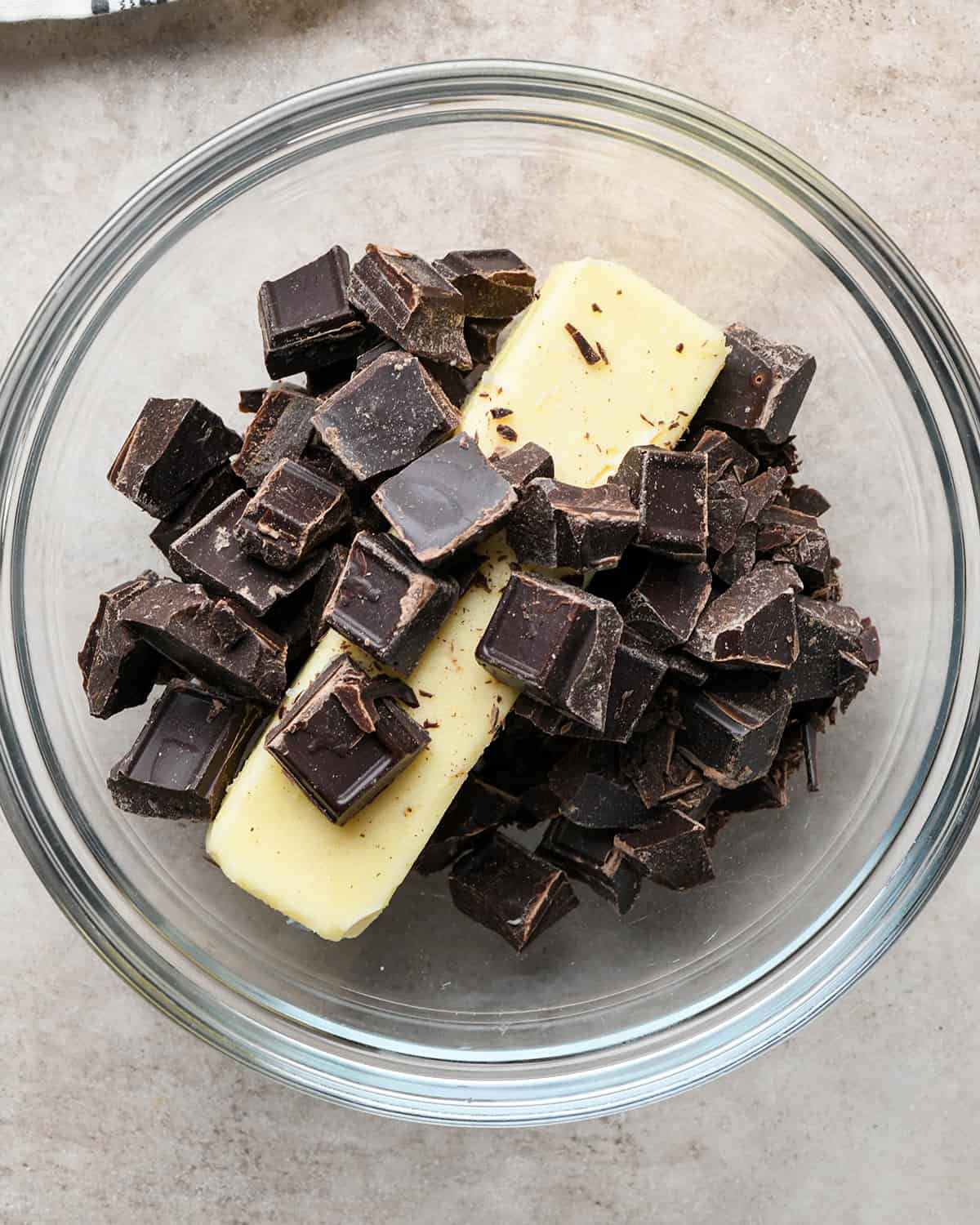 butter and chocolate in a glass bowl before melting