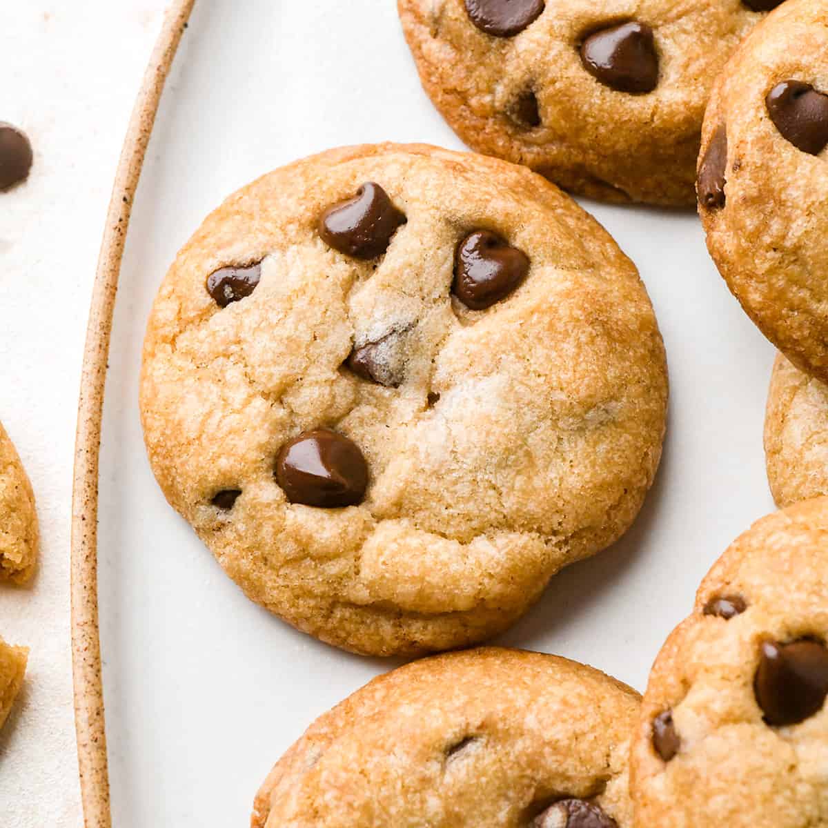 6 Vegan Chocolate Chip Cookies on a plate 