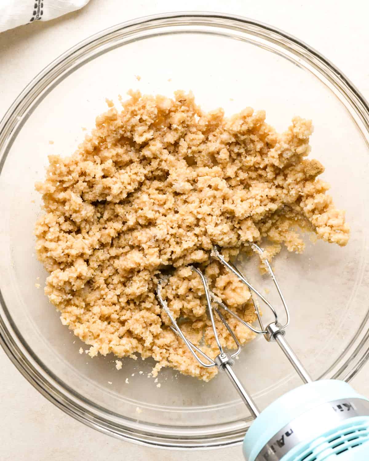 How to Make Vegan Chocolate Chip Cookies - coconut oil and sugars in a bowl after mixing