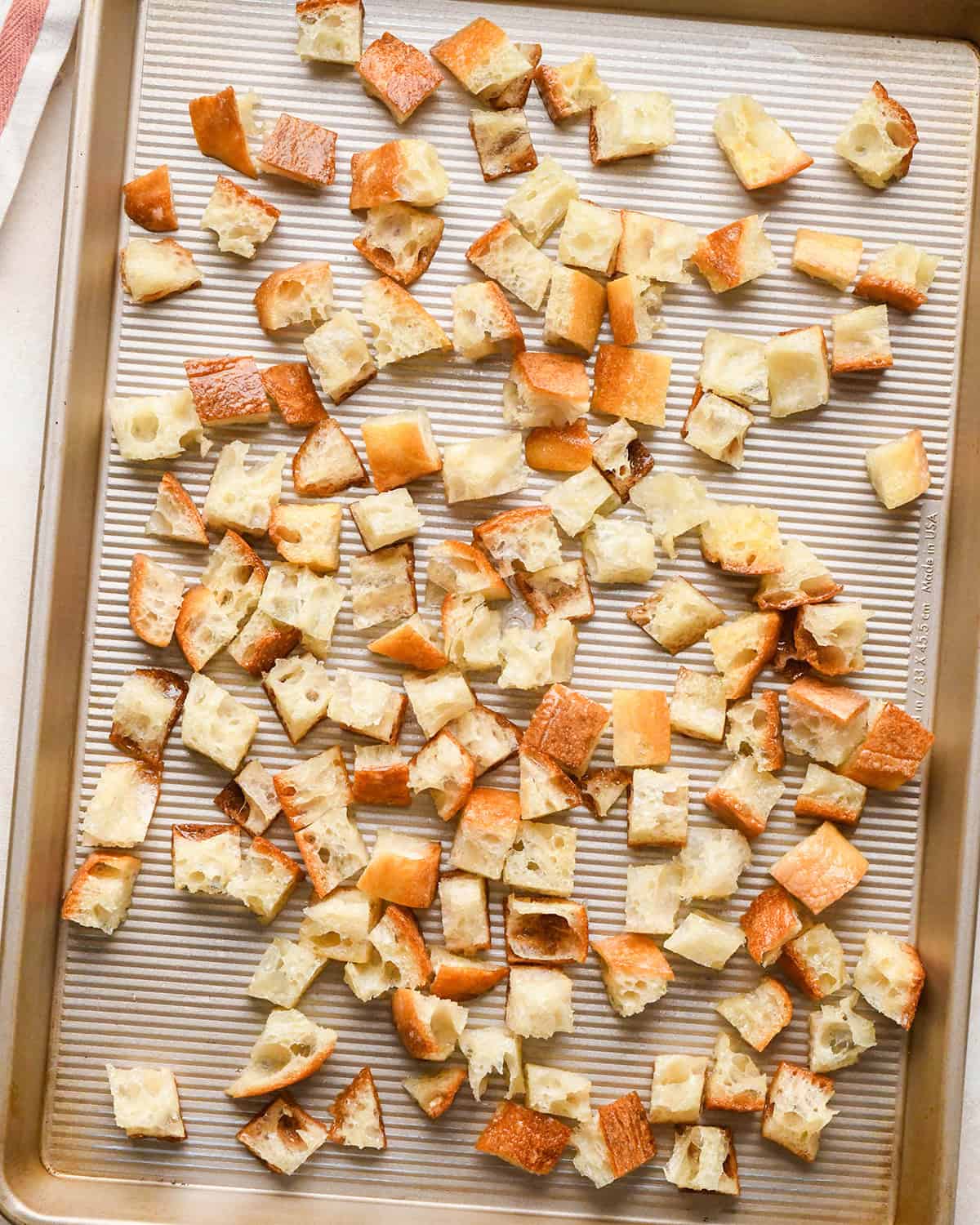 croutons on a baking sheet before baking