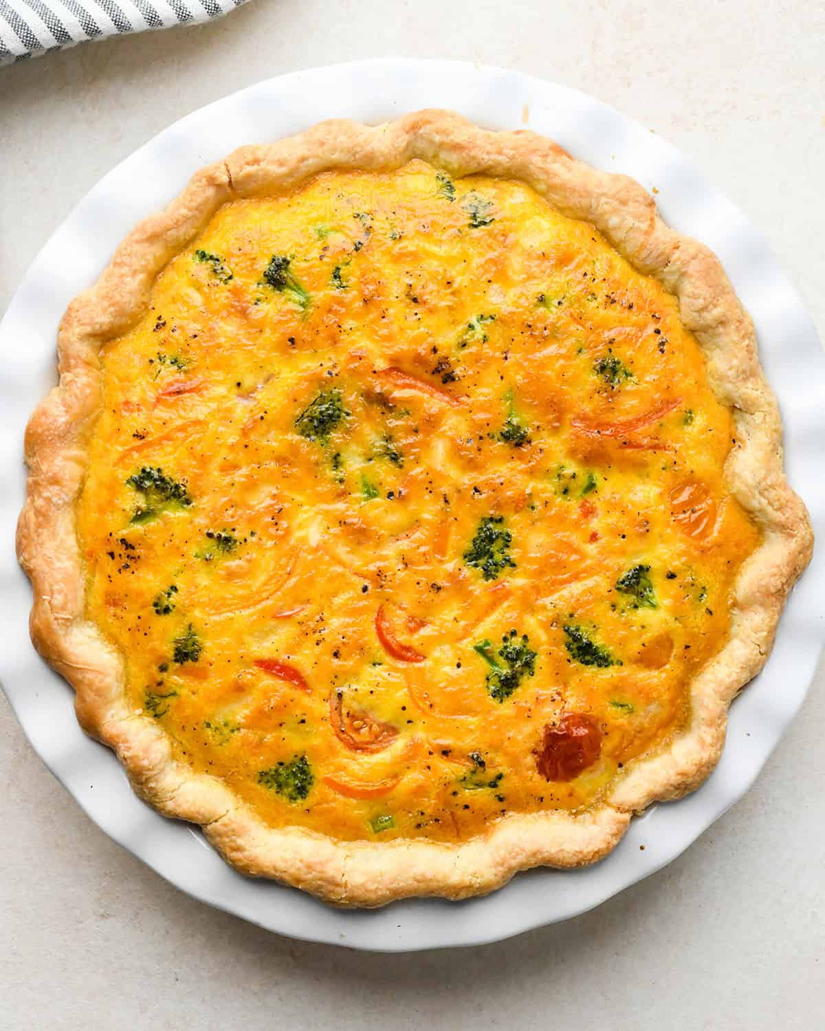 vegetable quiche in a pie dish after baking