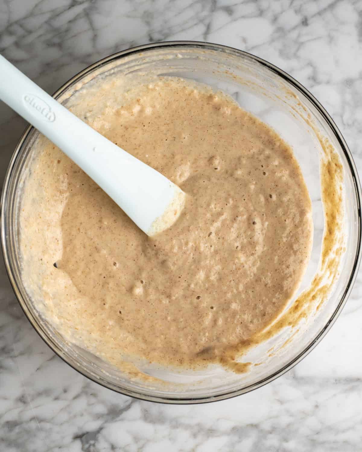 Whole Wheat Pancakes Recipe batter in a bowl with a spatula 
