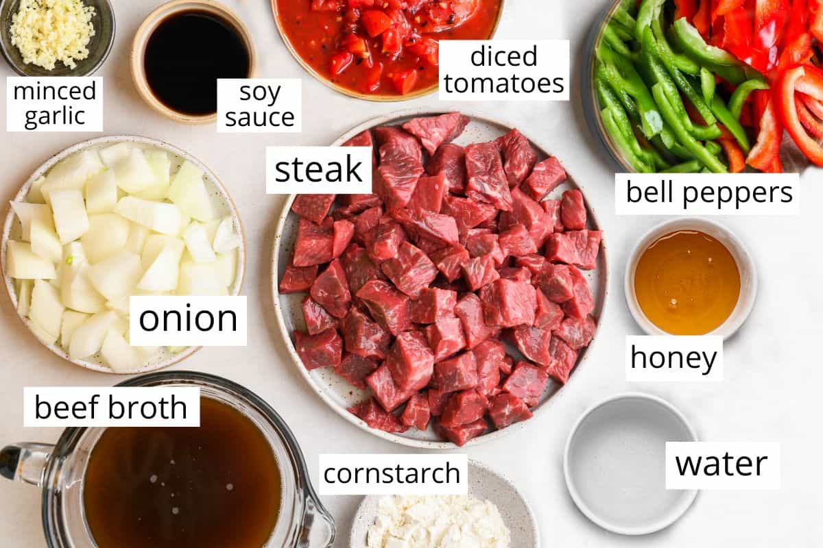 overhead photo of the labeled ingredients in this Slow Cooker Pepper Steak recipe