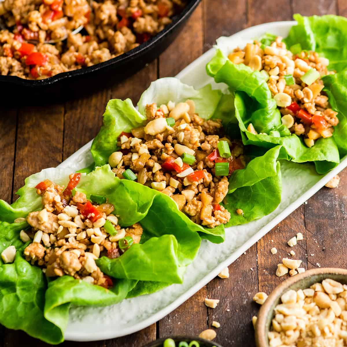 3 Asian Chicken Lettuce Wraps on a serving plate 