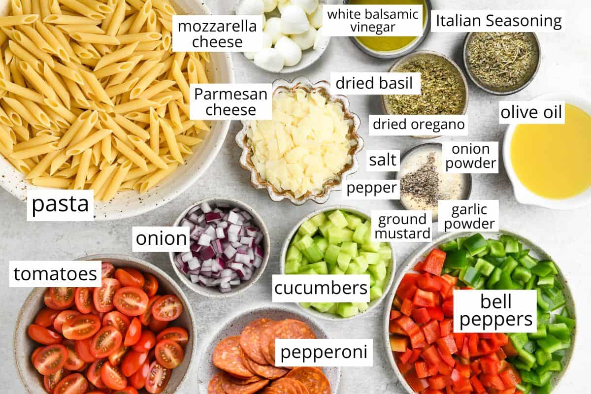 overhead photo of the labeled ingredients in this Best Pasta Salad Recipe