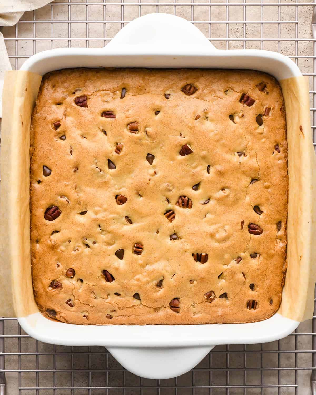 Browned Butter Blondies on a wire cooling rack in the baking dish