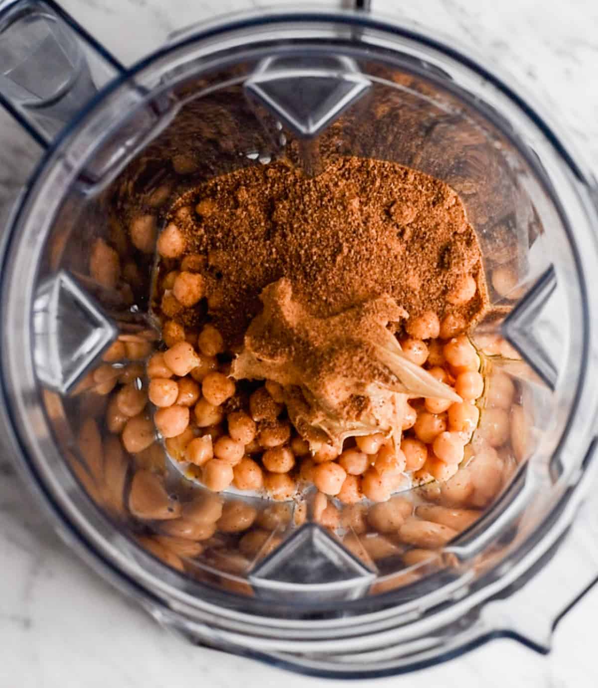 How to Make Chocolate Hummus - adding ingredients to the blending container before blending