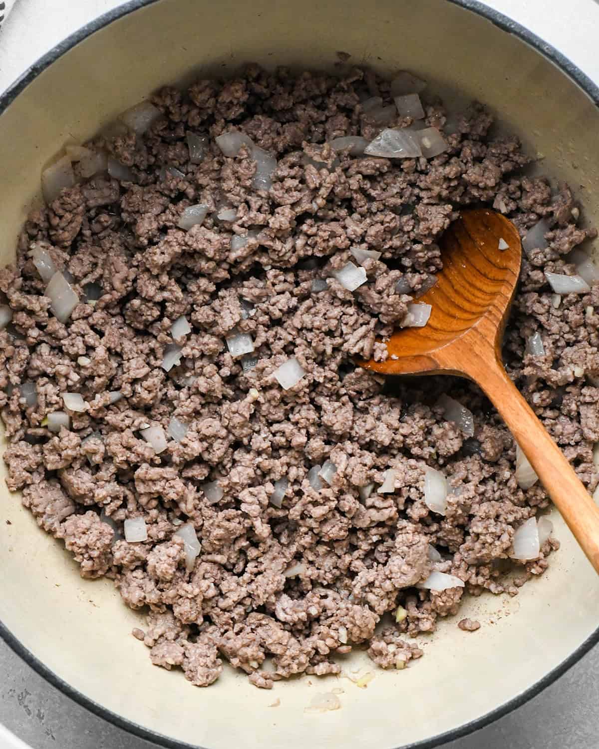 how to make Healthy Sloppy Joes - ground beef, onion and garlic in a pan after cooking