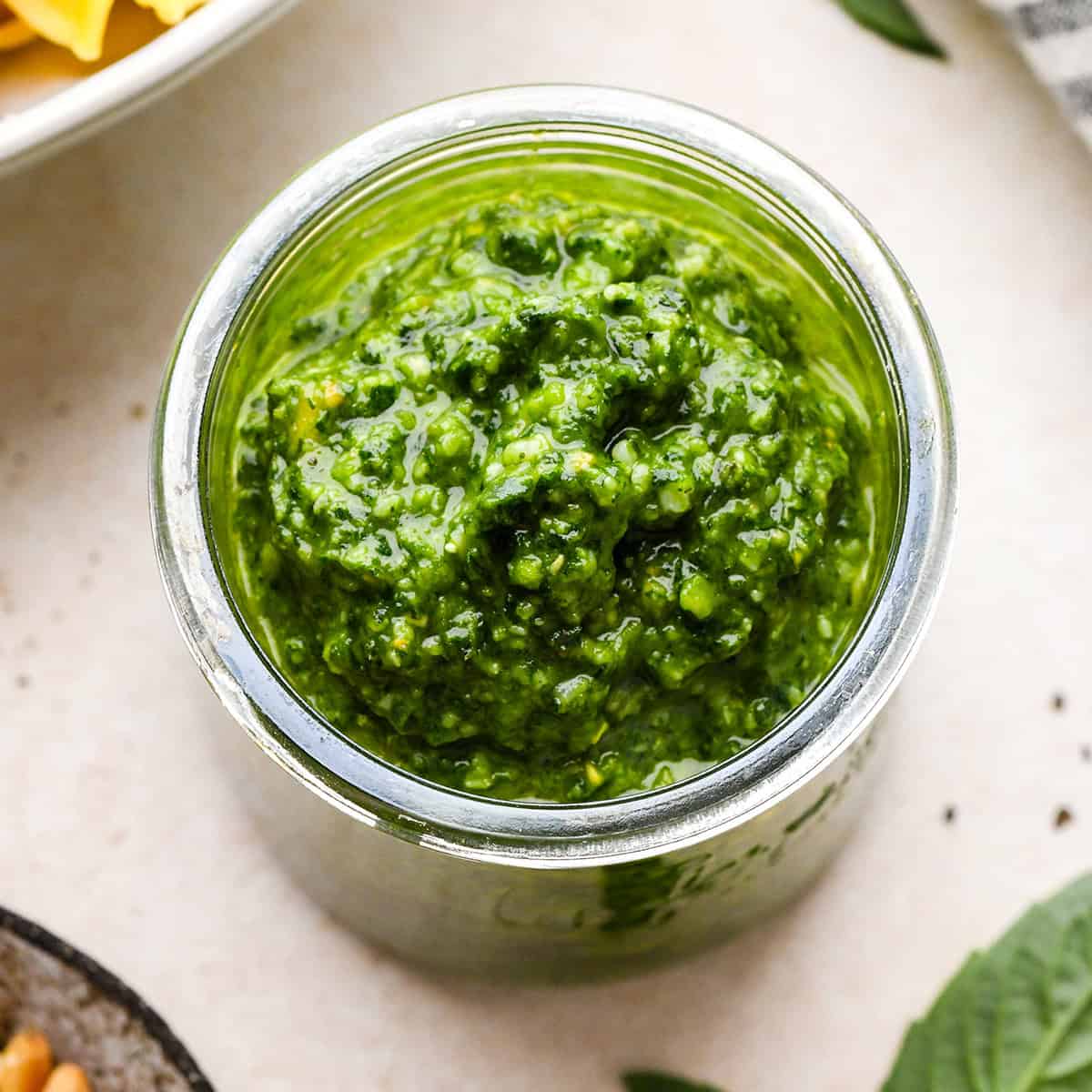 Homemade Basil Pesto Sauce in a glass jar