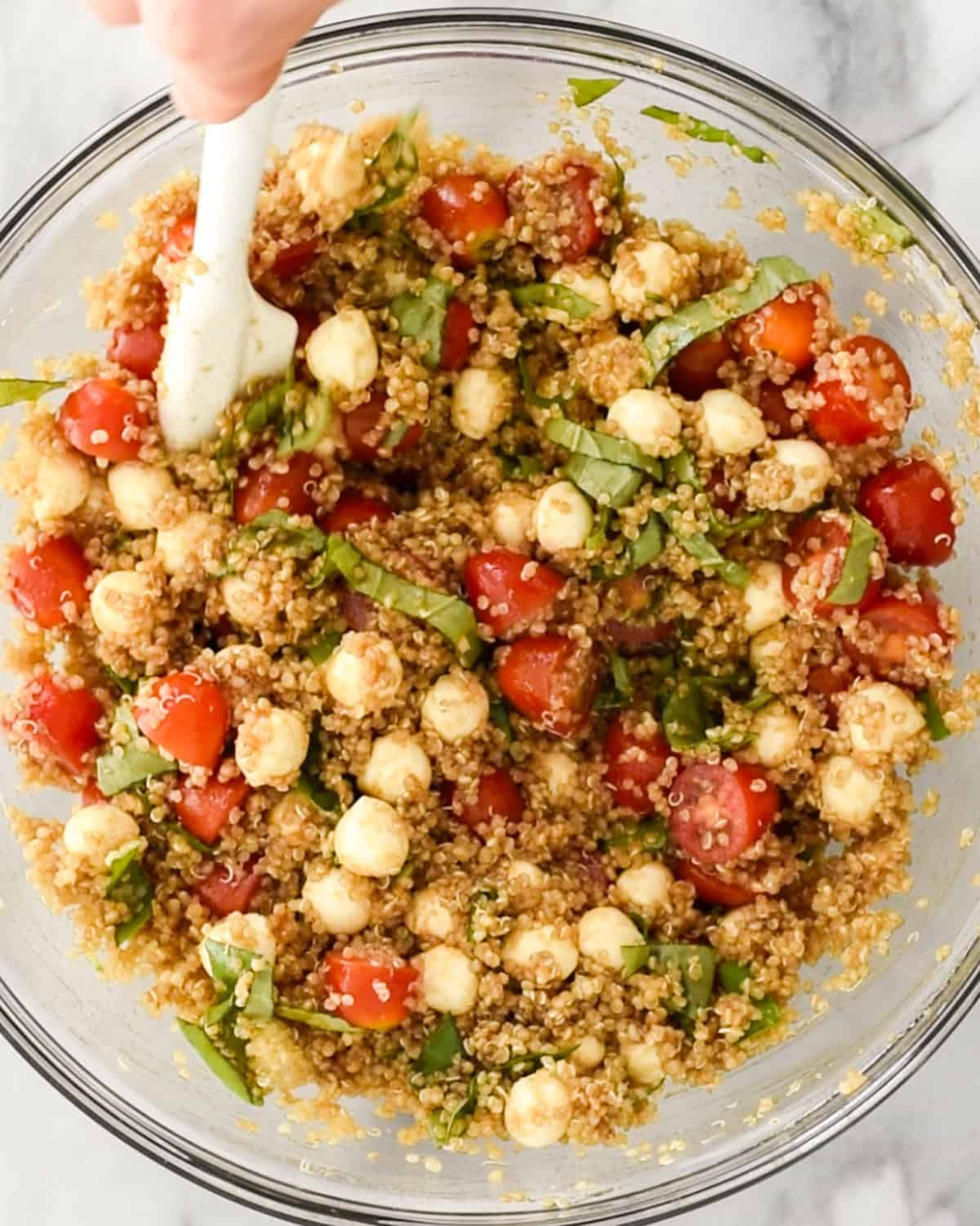 Caprese Quinoa Salad in a large glass bowl