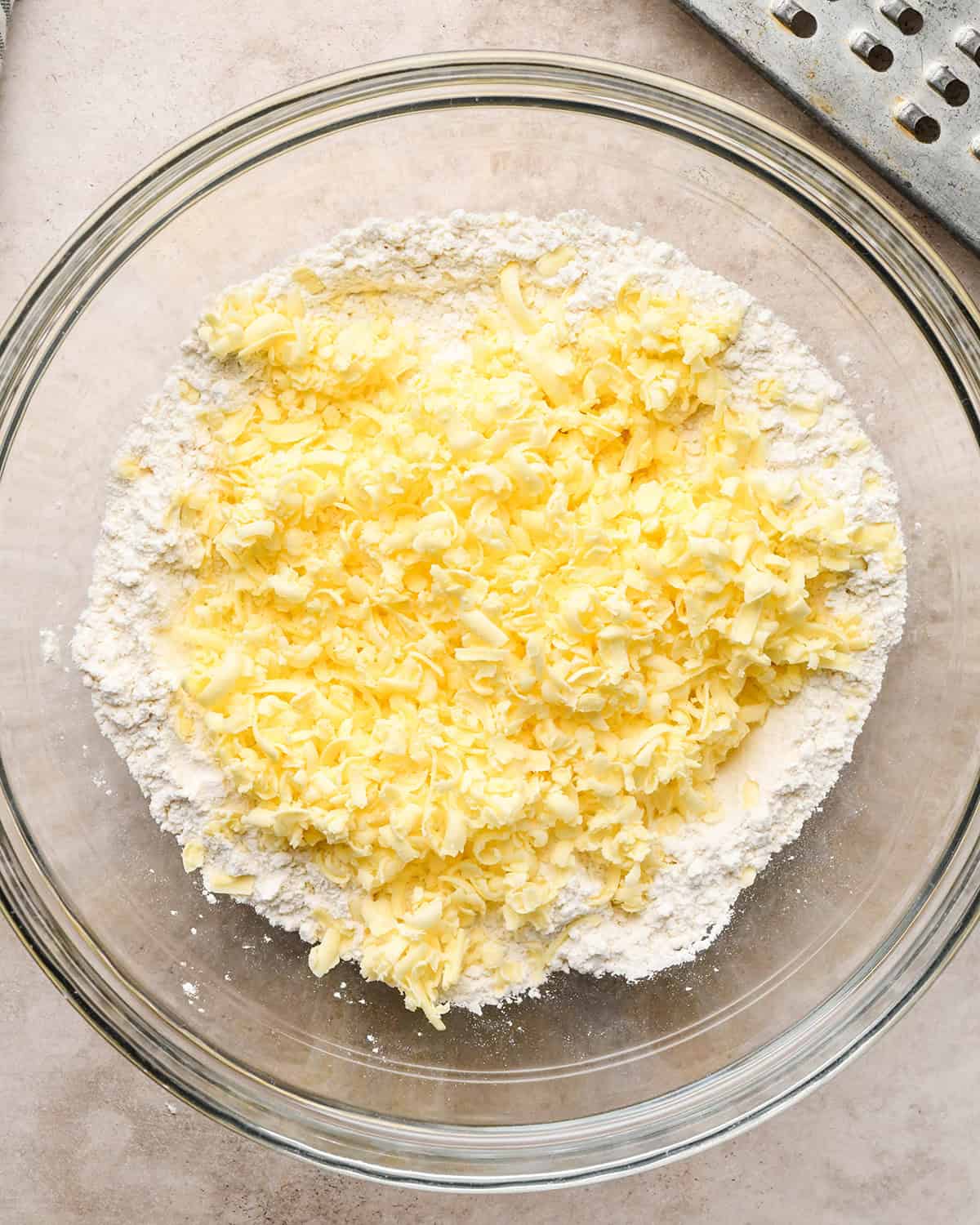 how to make cheese scones - butter grated into dry ingredients before mixing