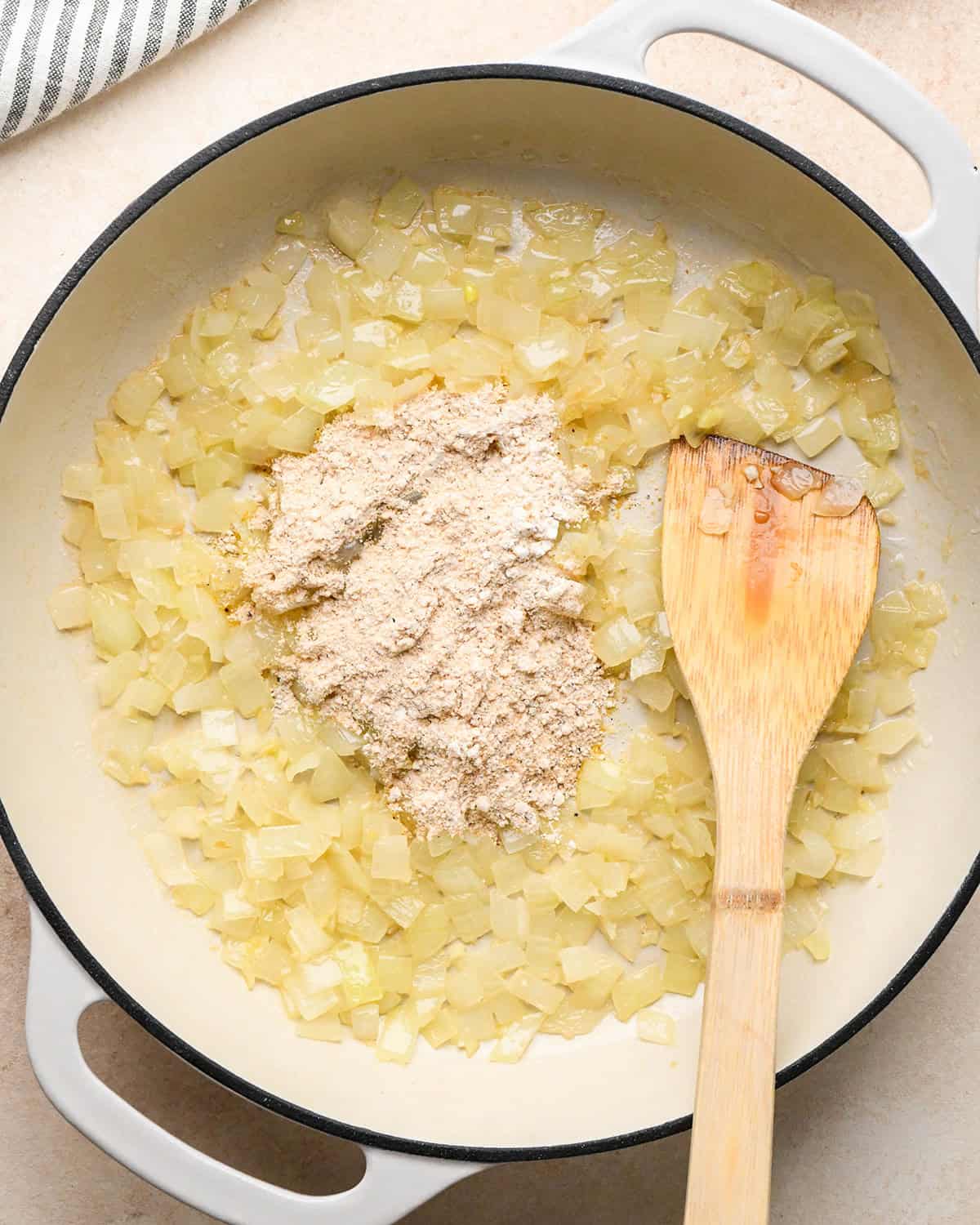 How to Make Chicken Curry - flour/spice mixture added to onions before stirring