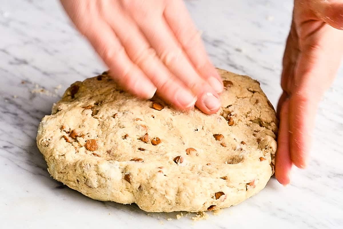 How to Make Cinnamon Scones - hands forming the dough into a circle