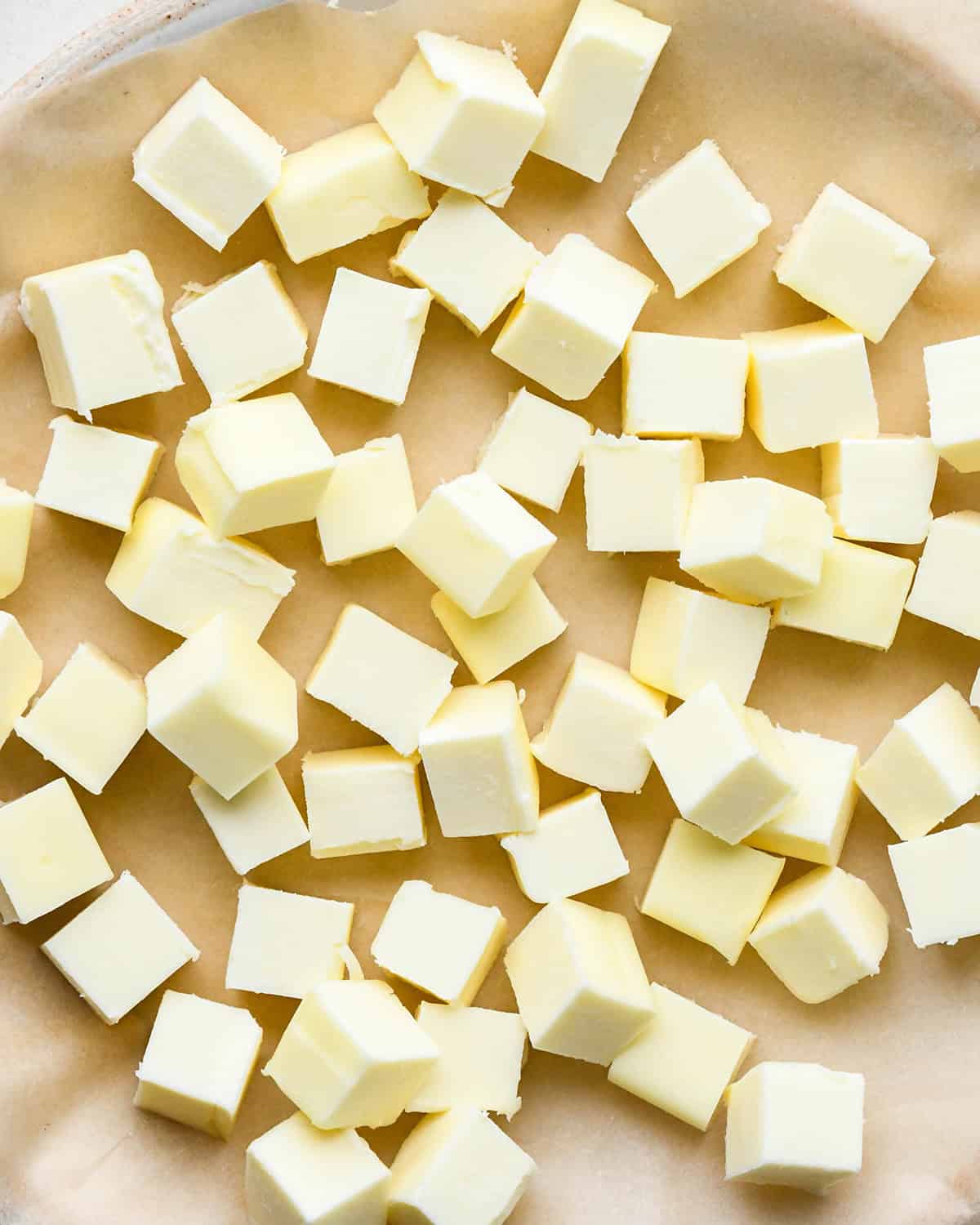 How to Make Dairy Free Pumpkin Pie Crust cubes of butter on a palte