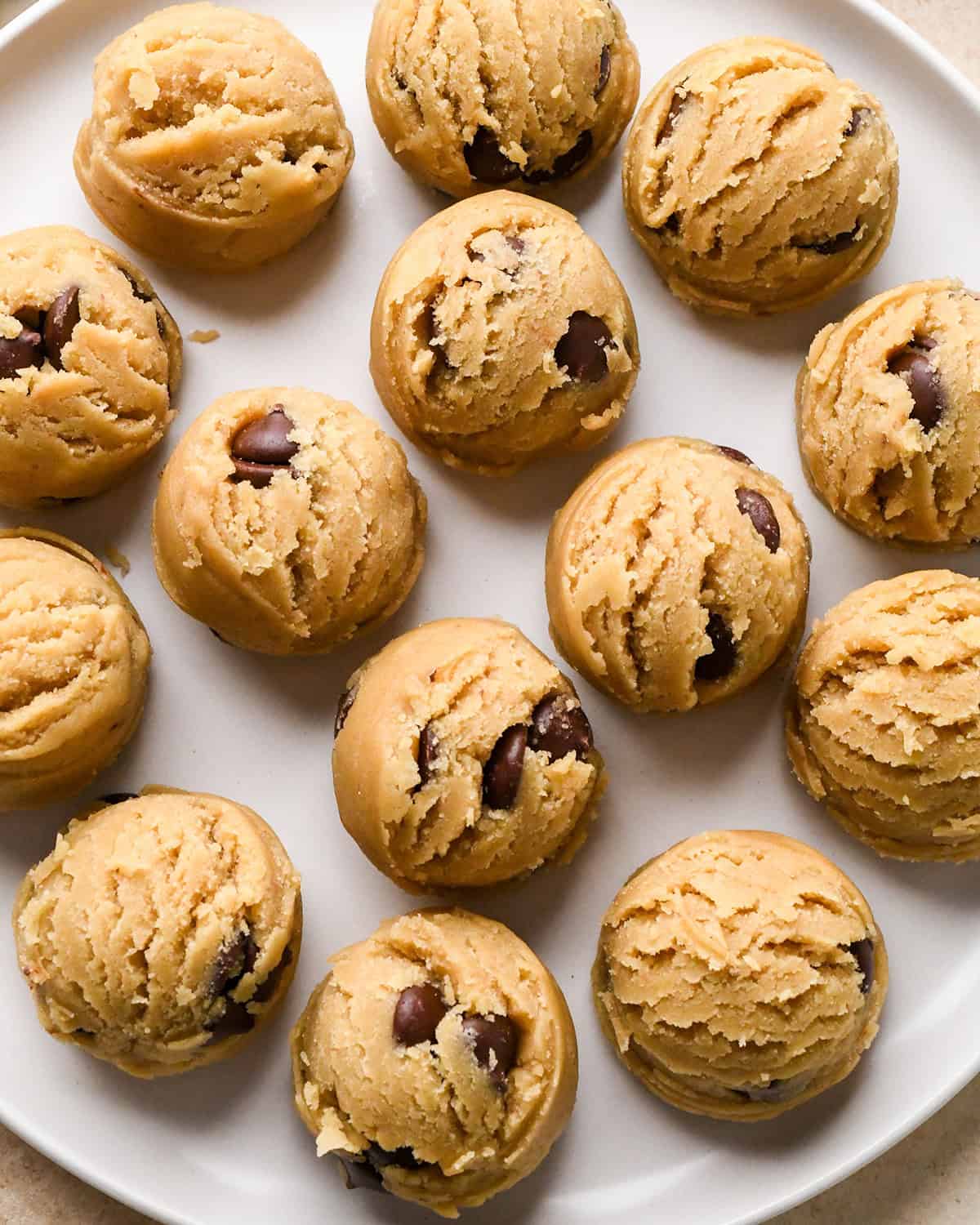 14 Edible Cookie Dough balls on a plate