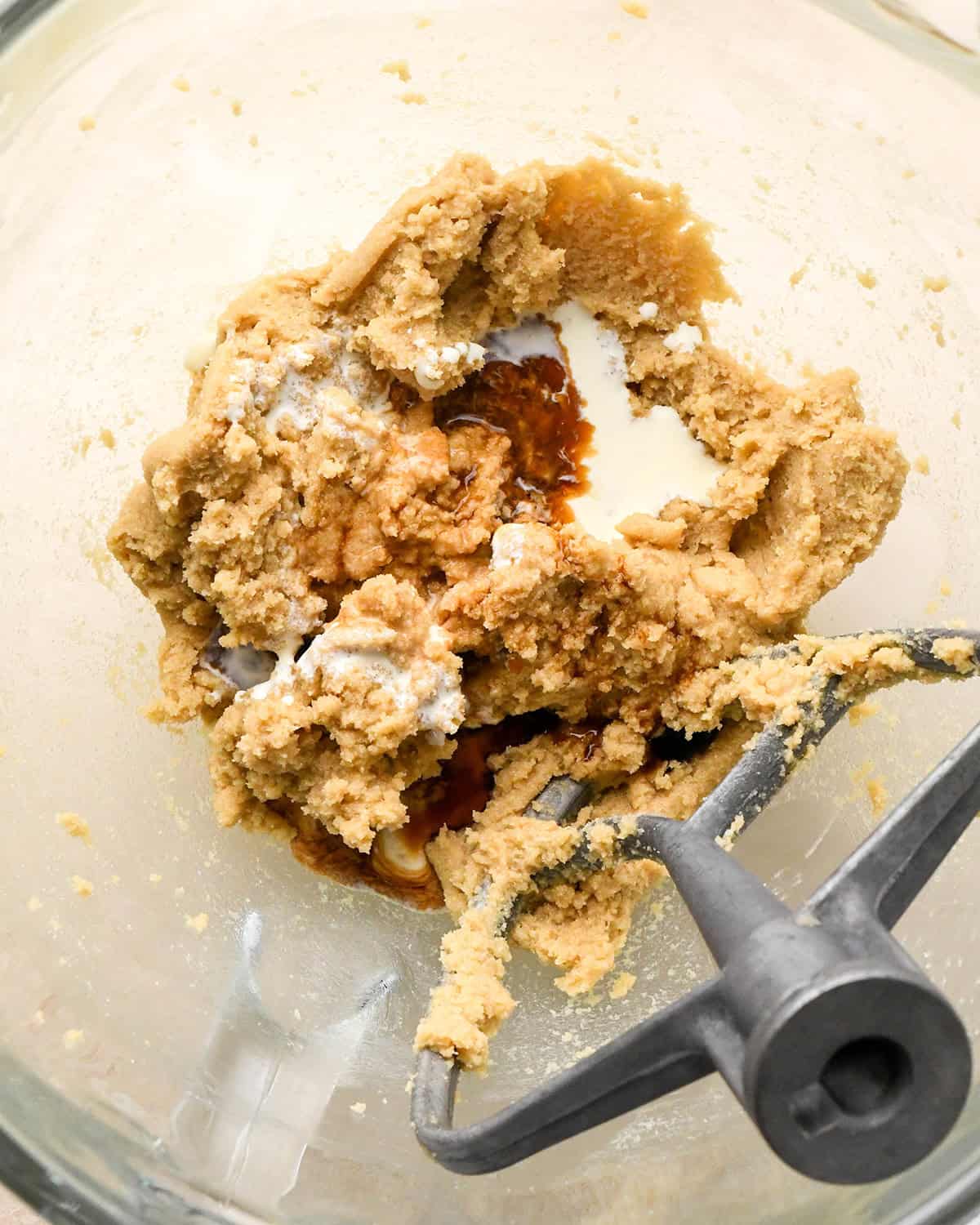 How to Make Edible Cookie Dough - adding vanilla and milk before beating