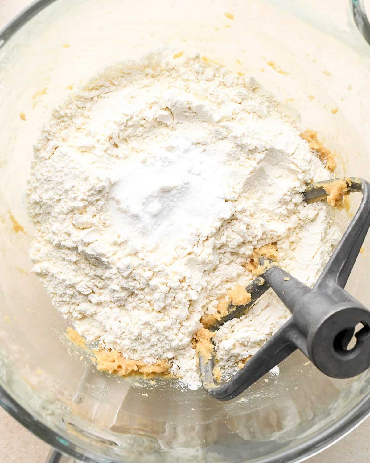 How to Make Edible Cookie Dough  - adding dry ingredients to butter mixture before beating