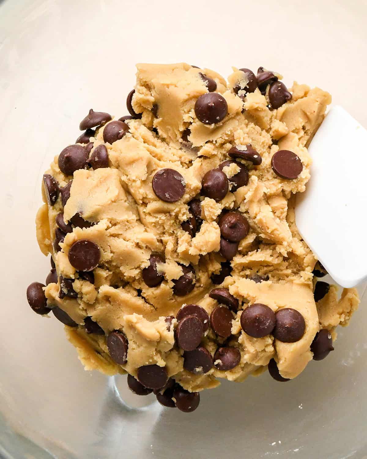 final edible cookie dough in a bowl with a spatula