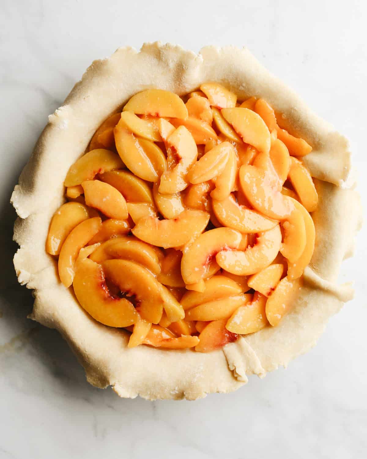 How to Make Peach Pie - filling put into bottom crust