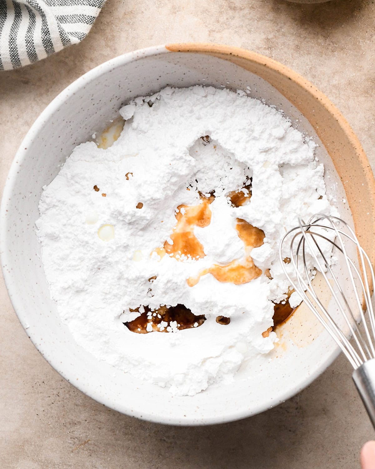 How to Make Vanilla Icing - ingredients in a bowl before whiksing. 